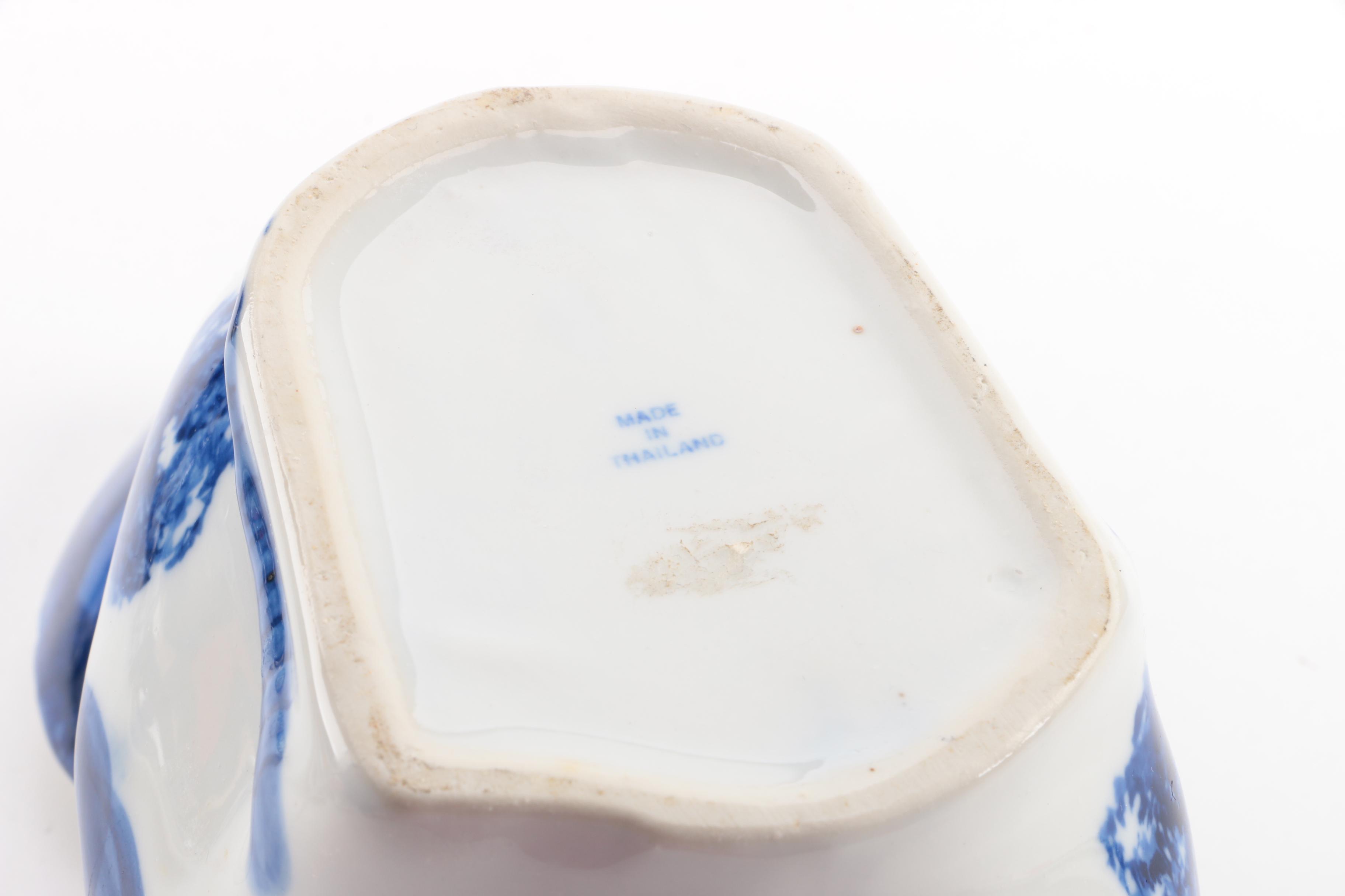 Assorted Blue and White Ceramic Decor Featuring Delft