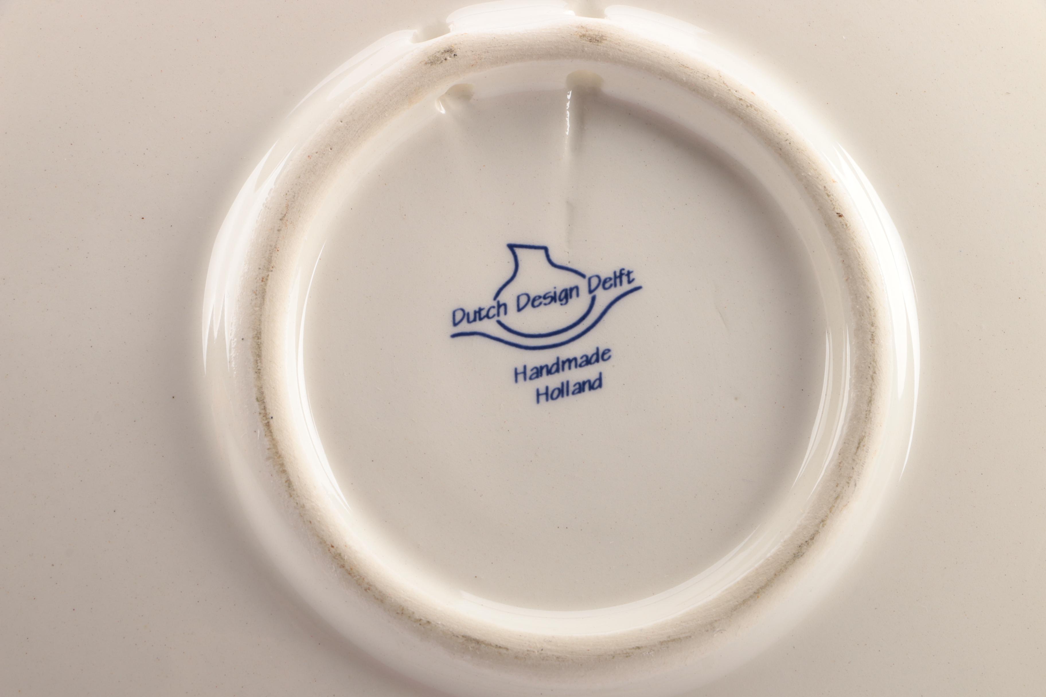 Assorted Blue and White Ceramic Decor Featuring Delft