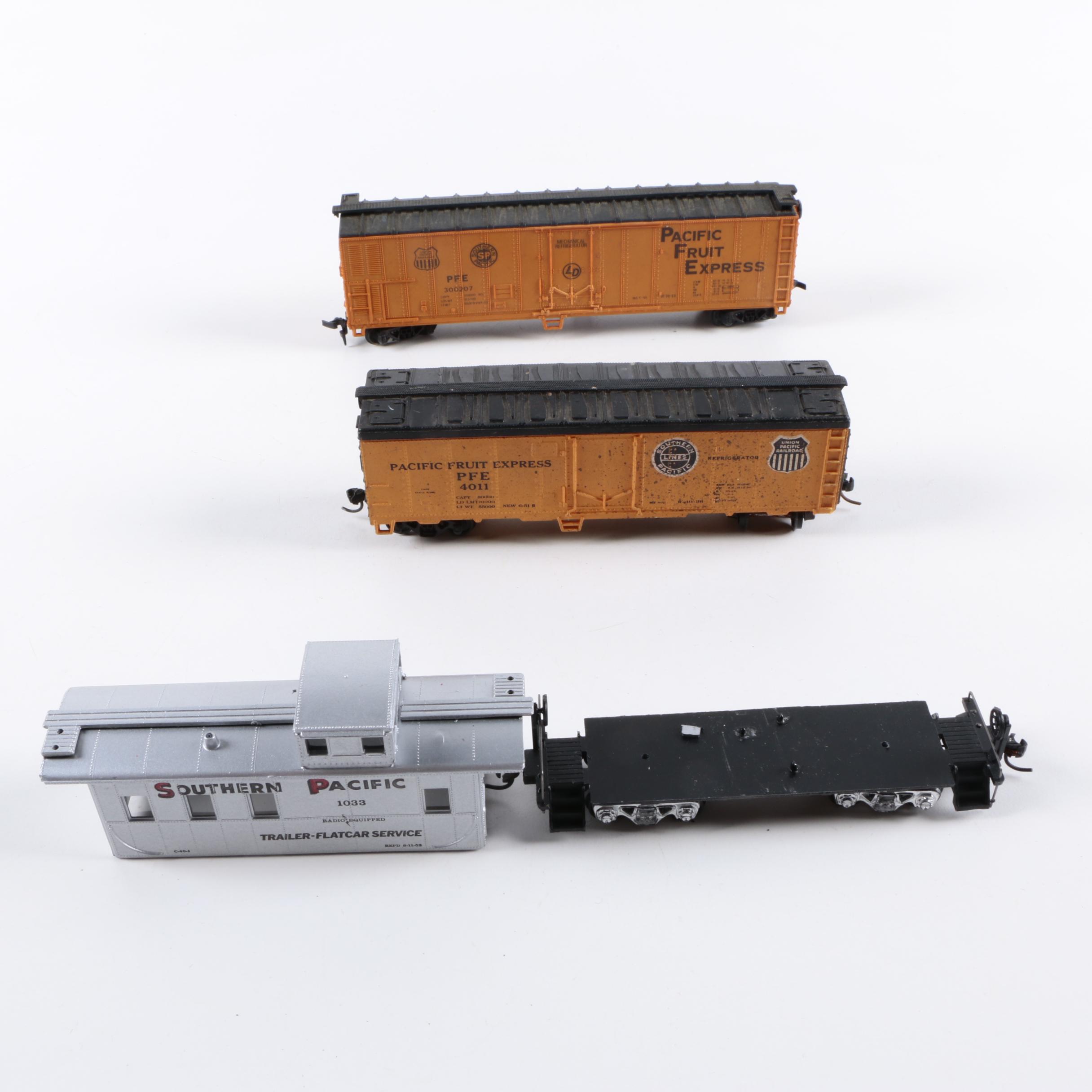 Assorted HO Scale Train Cars Including Varney