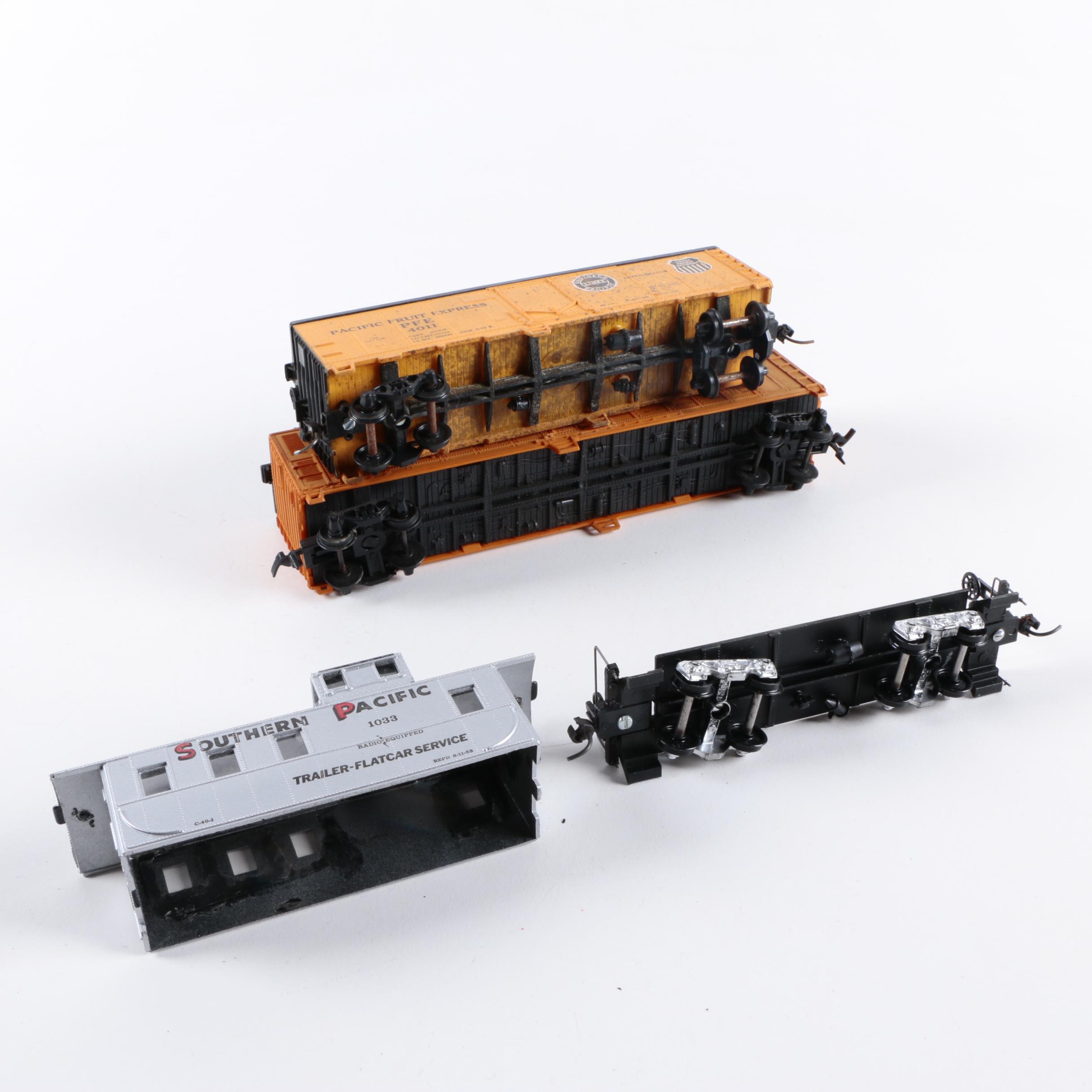 Assorted HO Scale Train Cars Including Varney