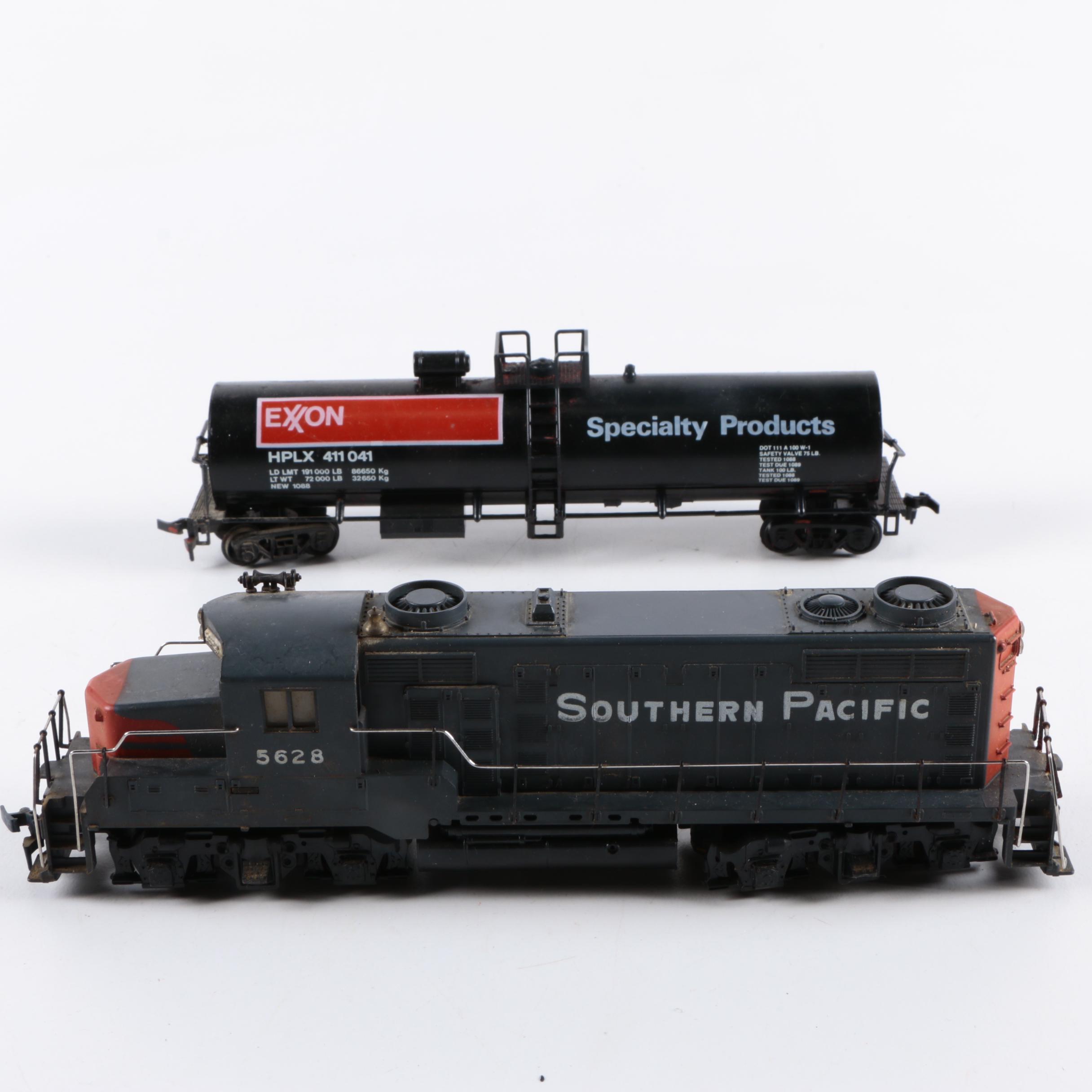 Assorted HO Scale Train Cars Including Varney
