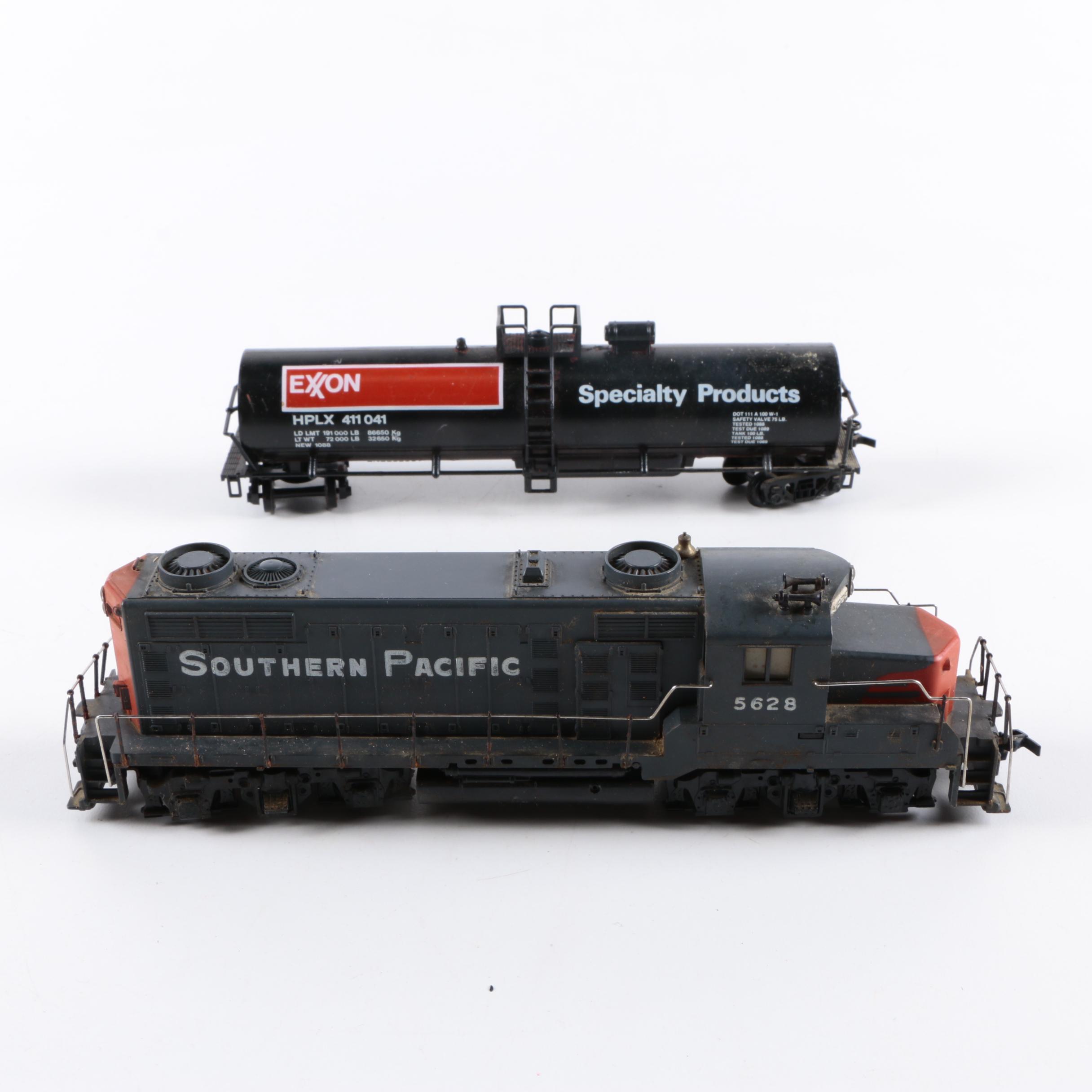 Assorted HO Scale Train Cars Including Varney