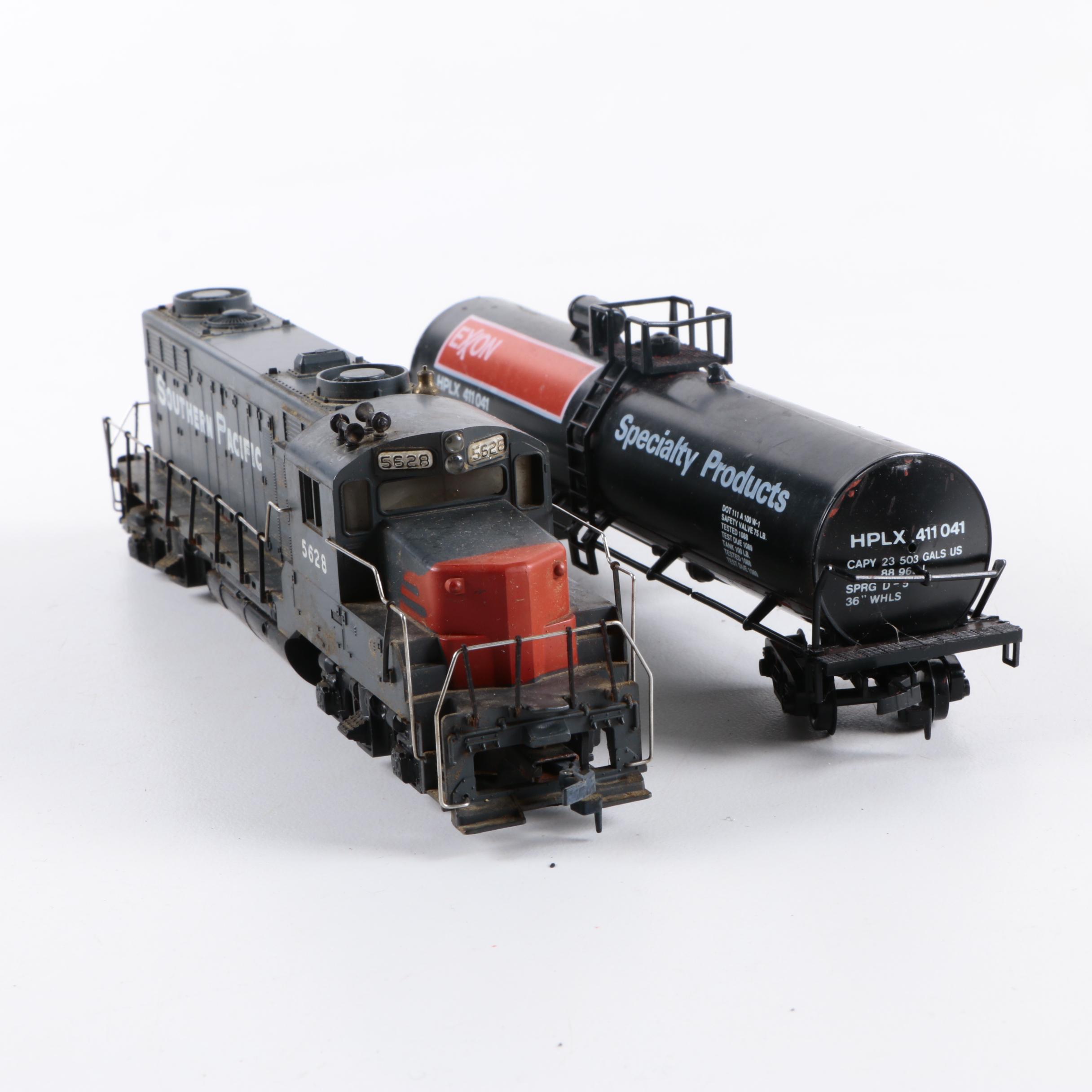 Assorted HO Scale Train Cars Including Varney