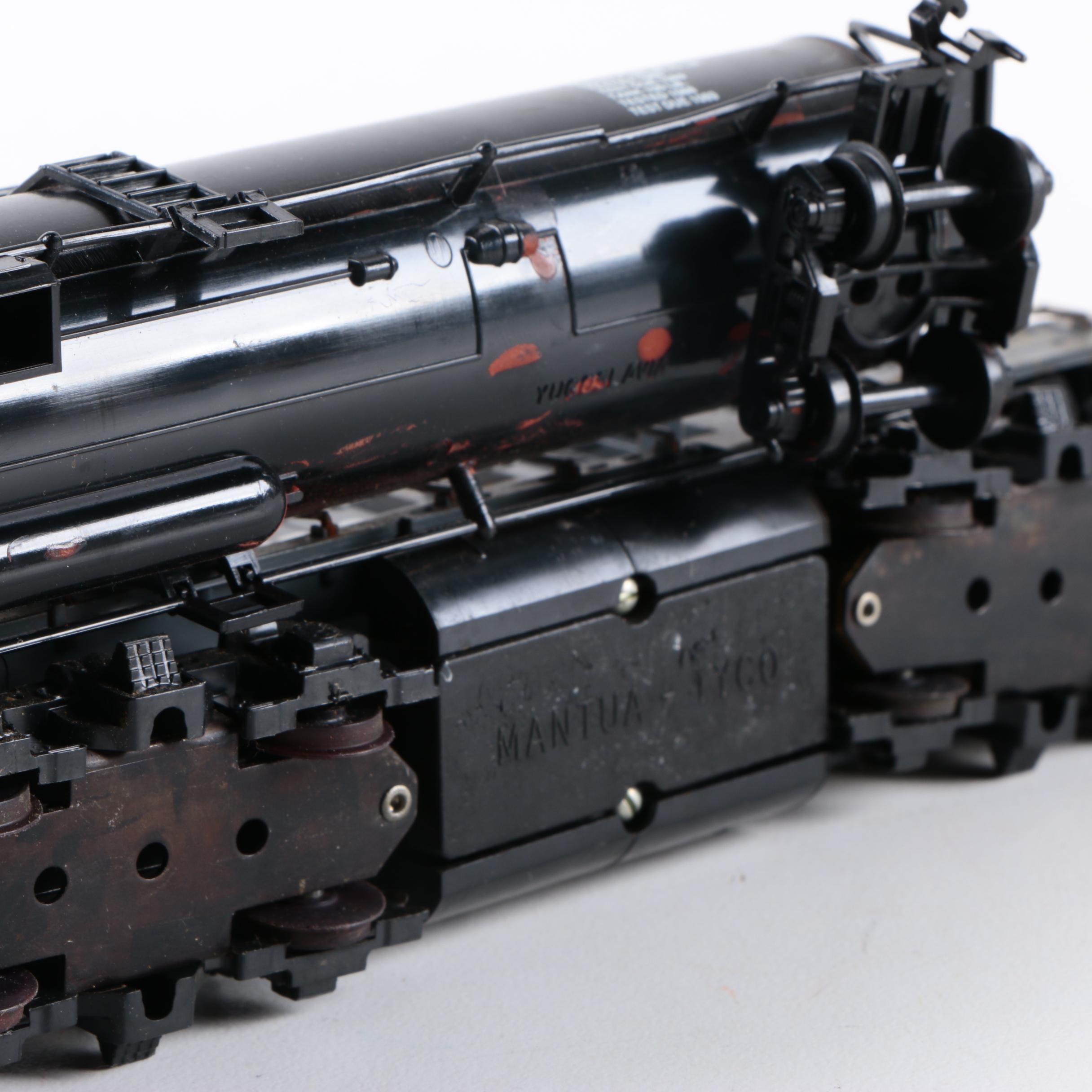 Assorted HO Scale Train Cars Including Varney