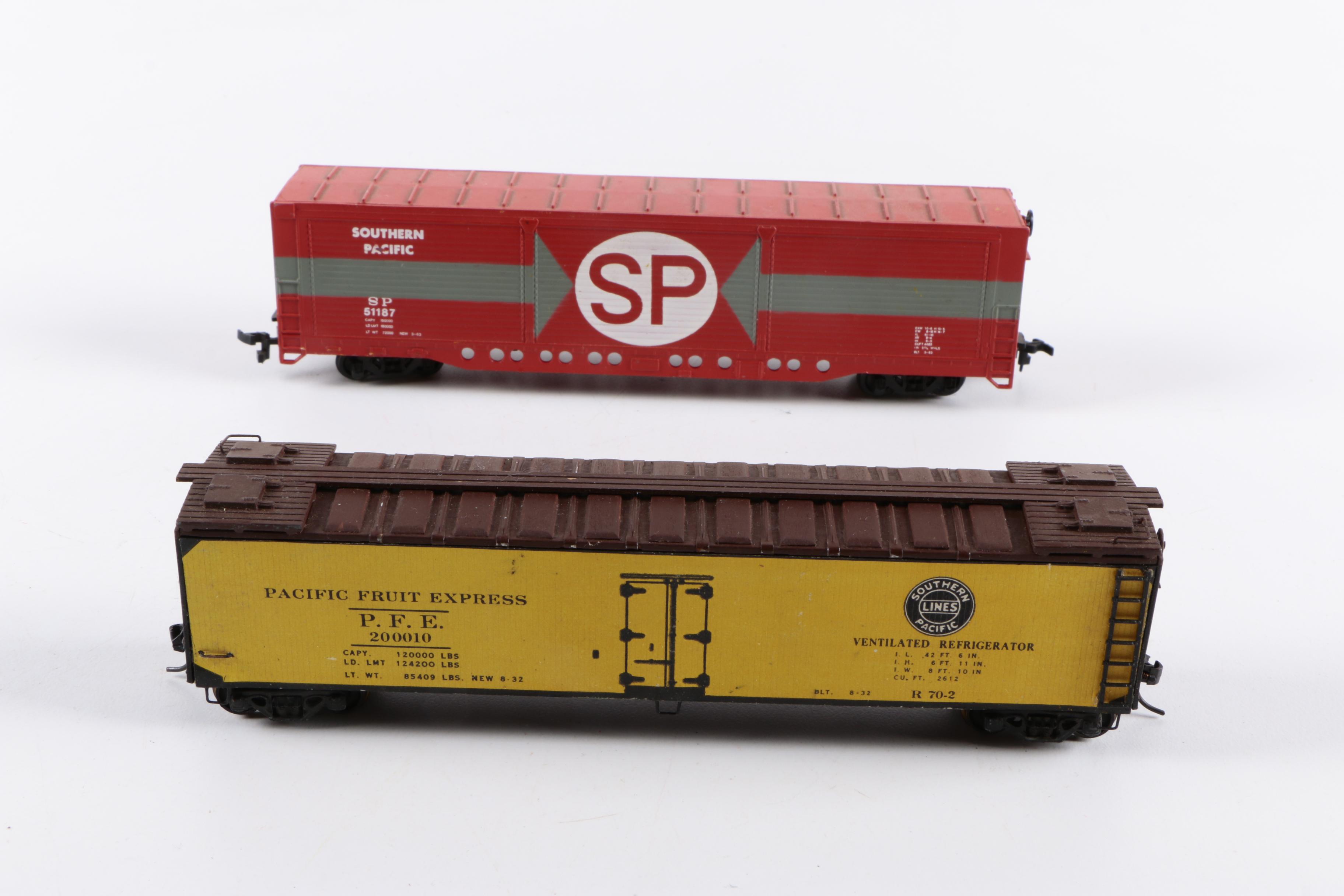 Assorted HO Scale Train Cars Including Varney