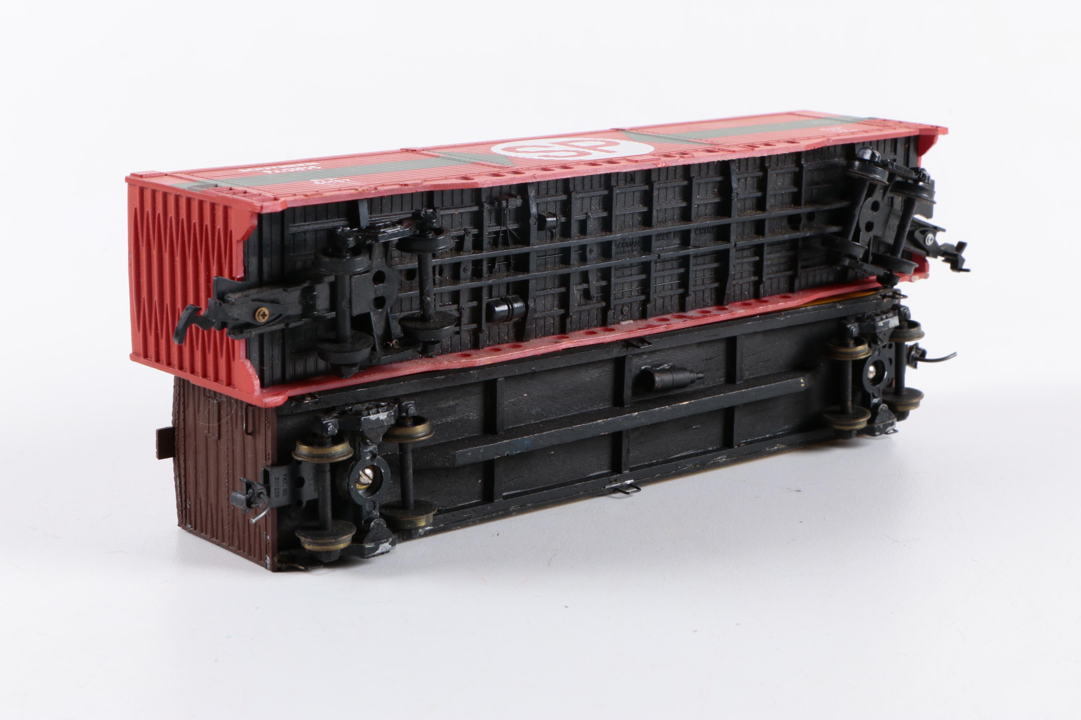 Assorted HO Scale Train Cars Including Varney