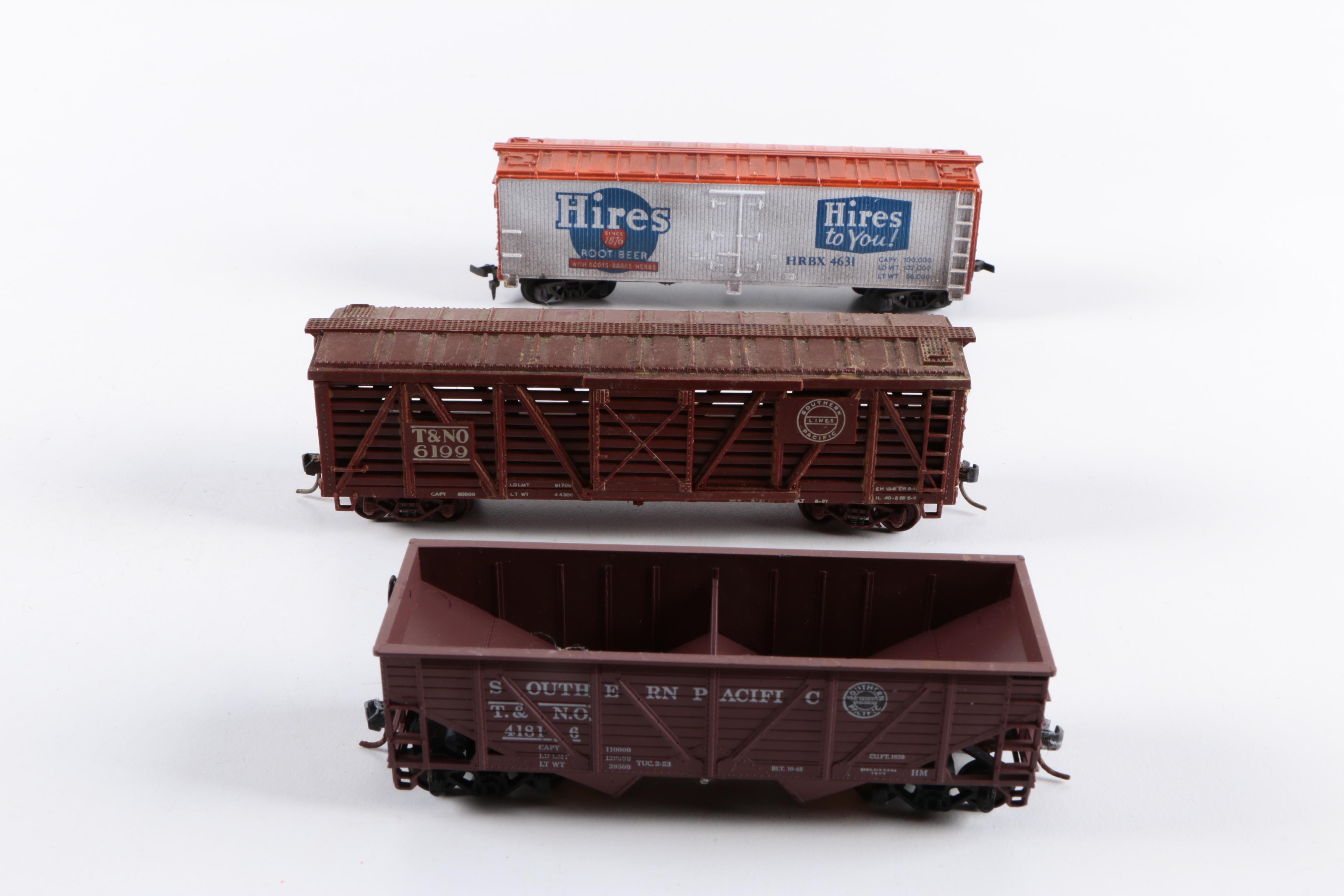 Assorted HO Scale Train Cars Including Varney