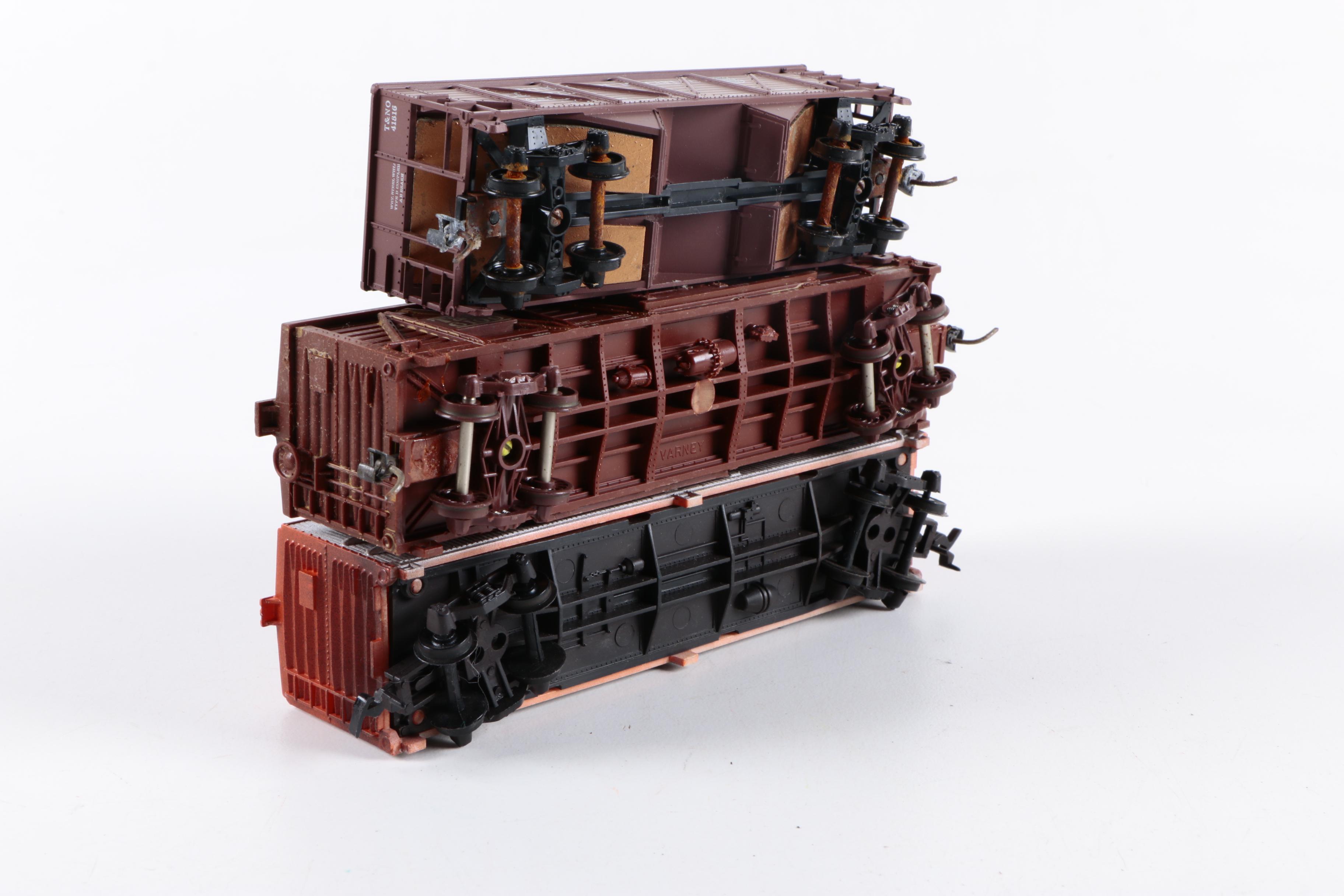 Assorted HO Scale Train Cars Including Varney