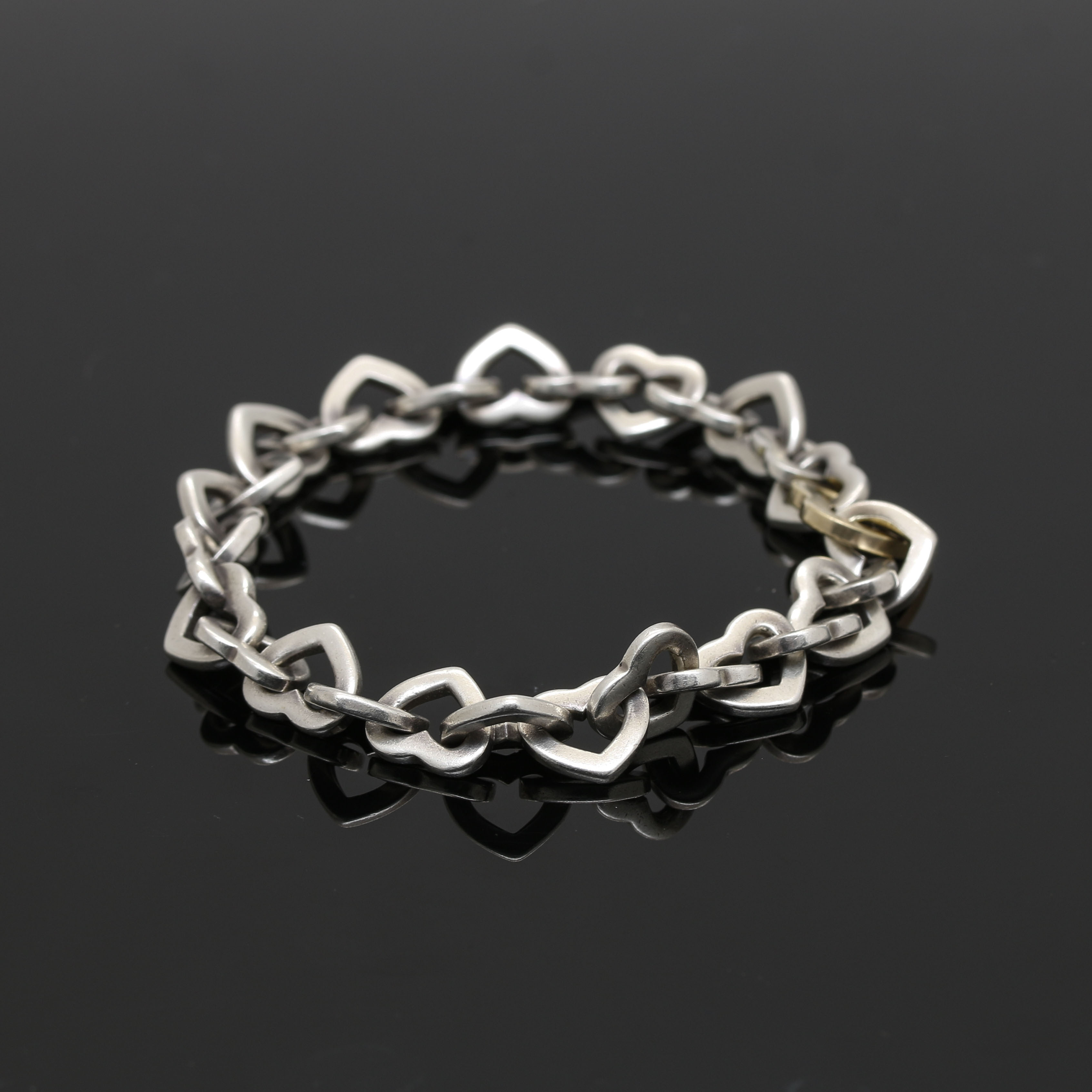 Tiffany & Co. Sterling Silver and 18K Yellow Gold Open Heart Bracelet