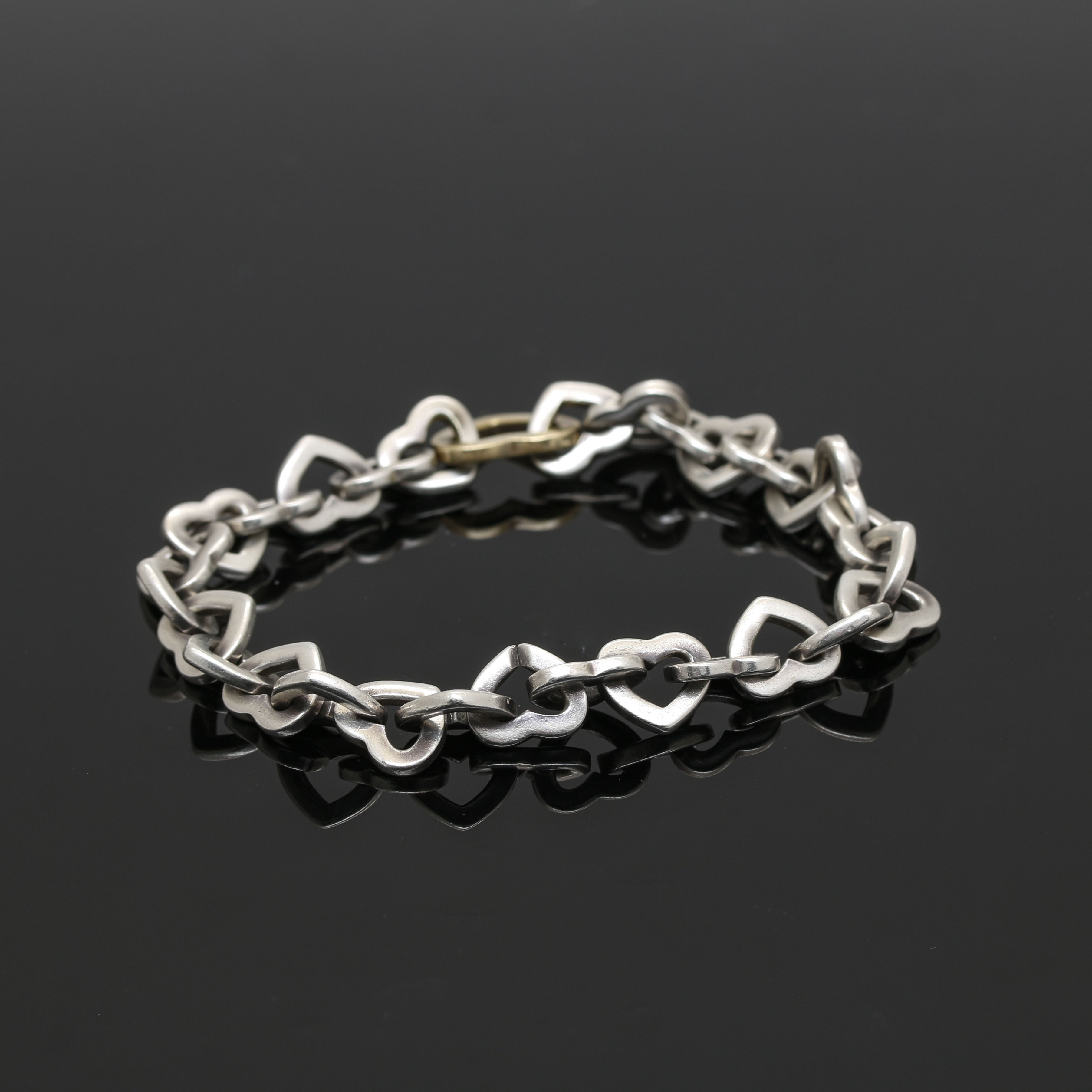 Tiffany & Co. Sterling Silver and 18K Yellow Gold Open Heart Bracelet