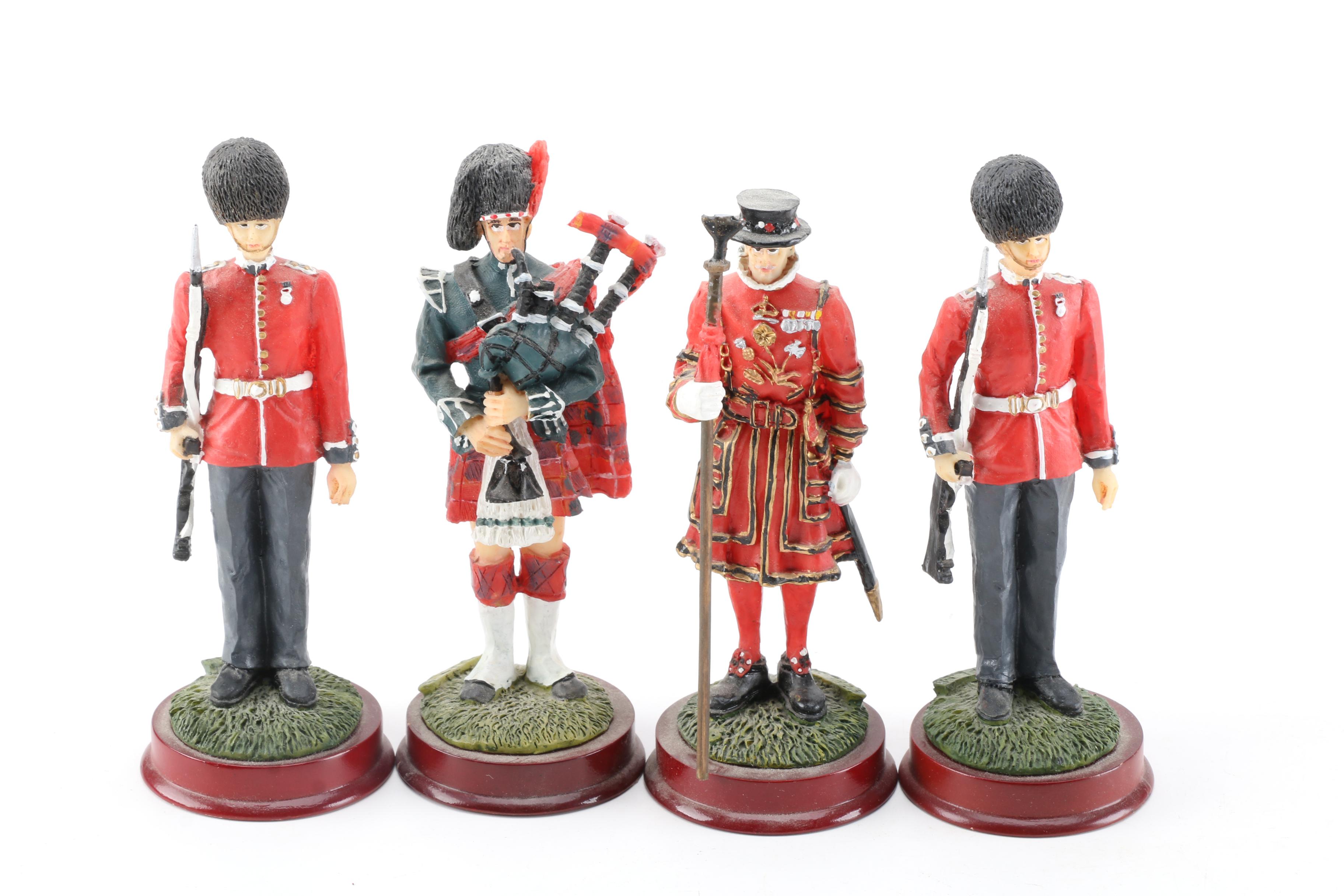 British Military Figurines Including Bagpipers and Beefeaters