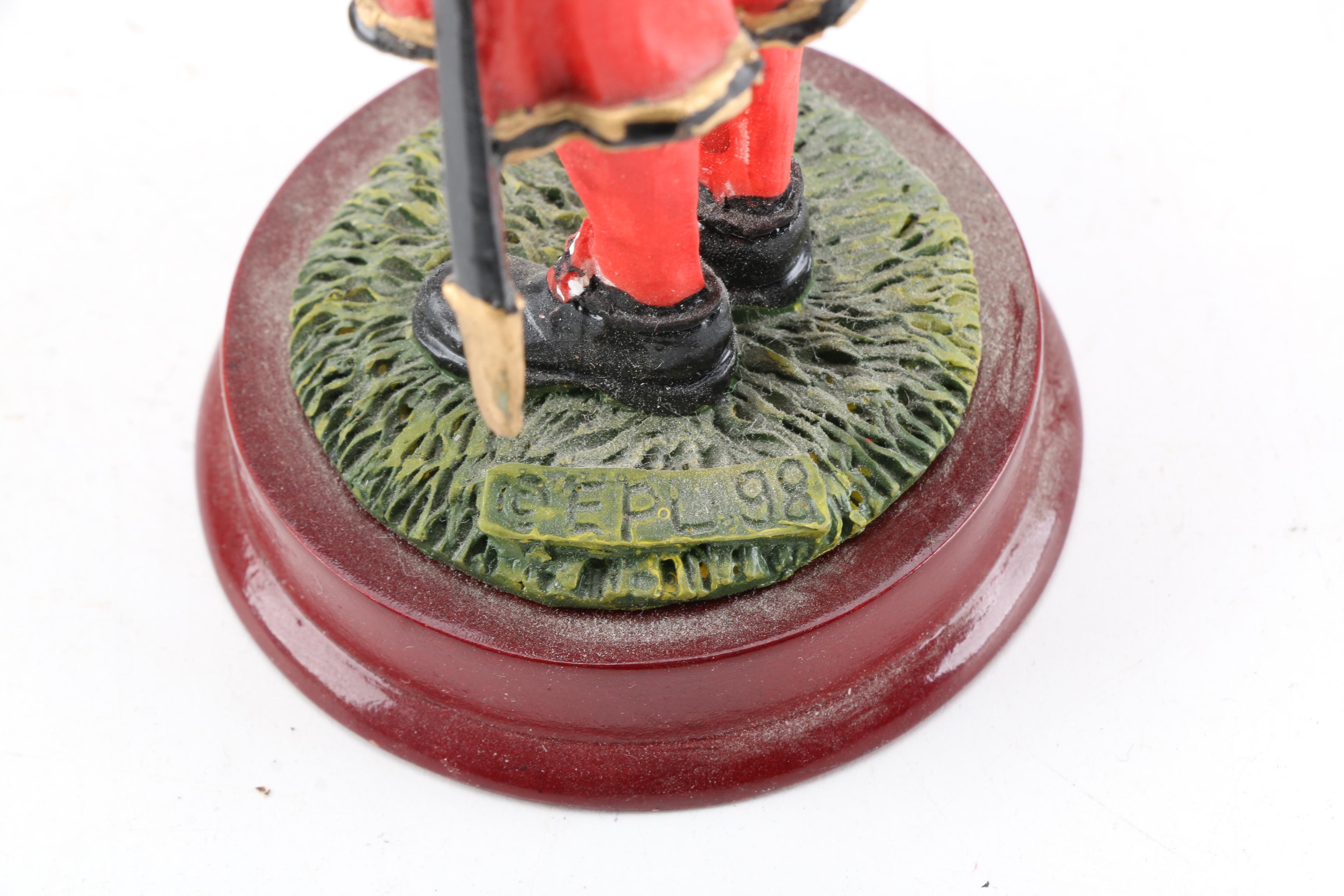 British Military Figurines Including Bagpipers and Beefeaters