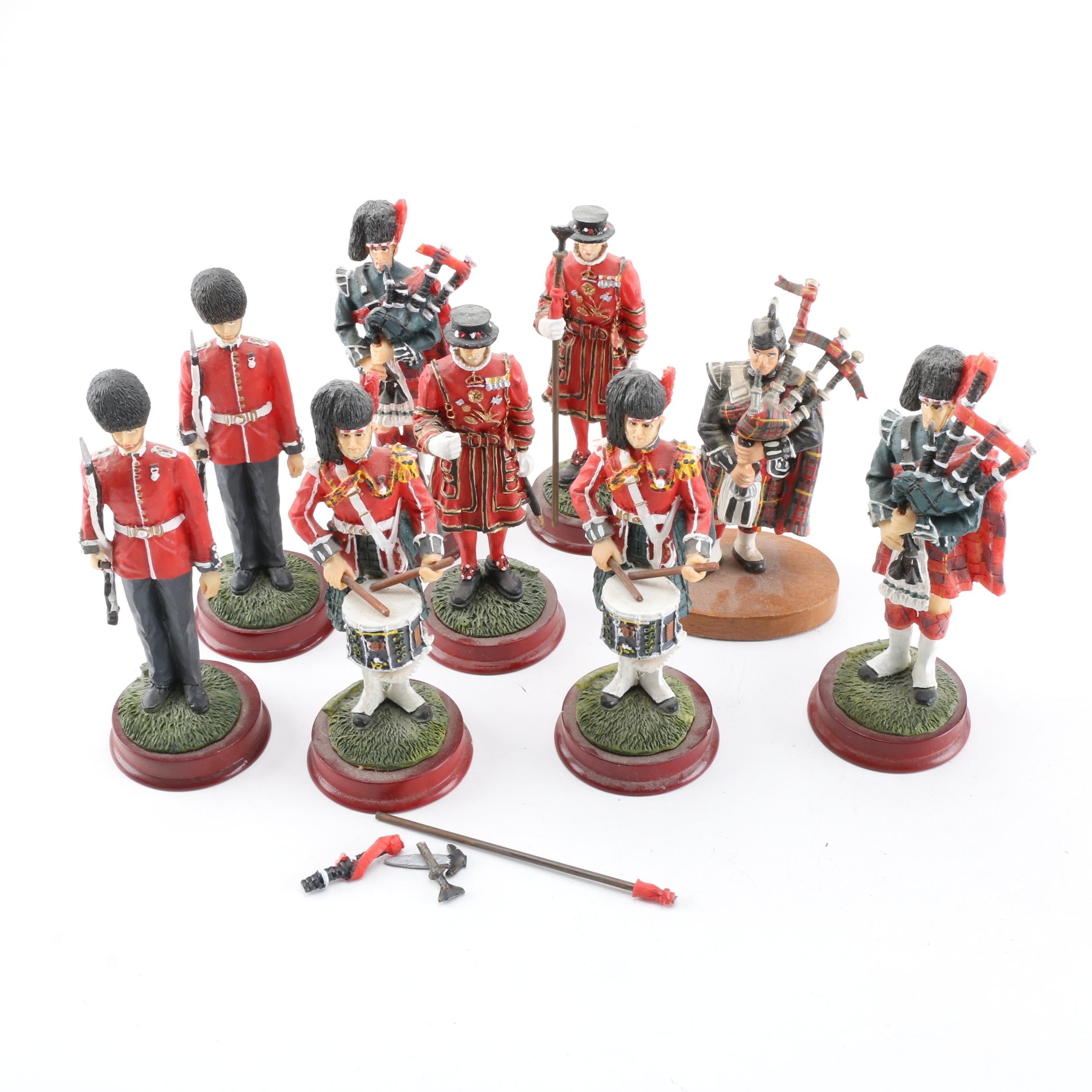 British Military Figurines Including Bagpipers and Beefeaters