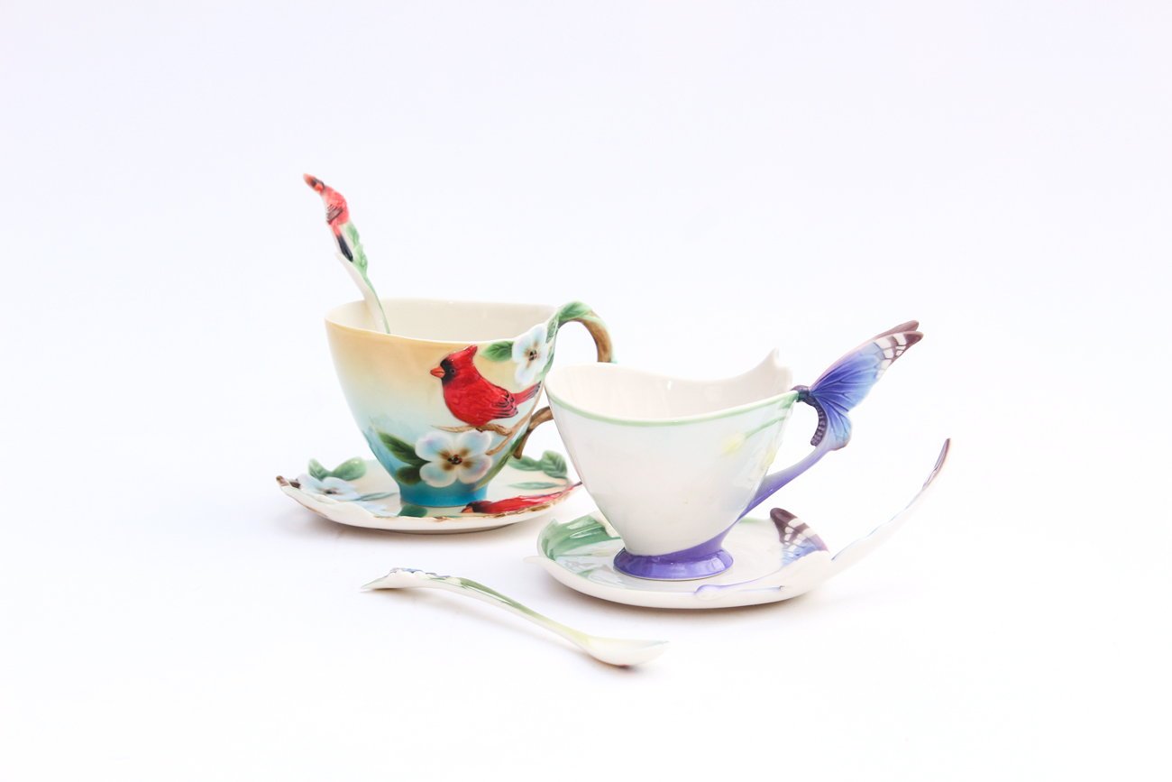 Pair of Franz Teacup, Saucer and Spoon Sets