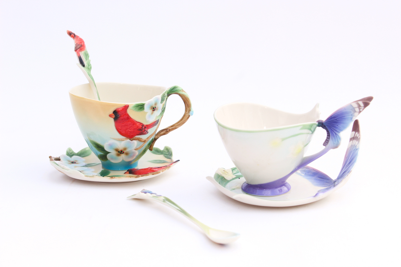 Pair of Franz Teacup, Saucer and Spoon Sets