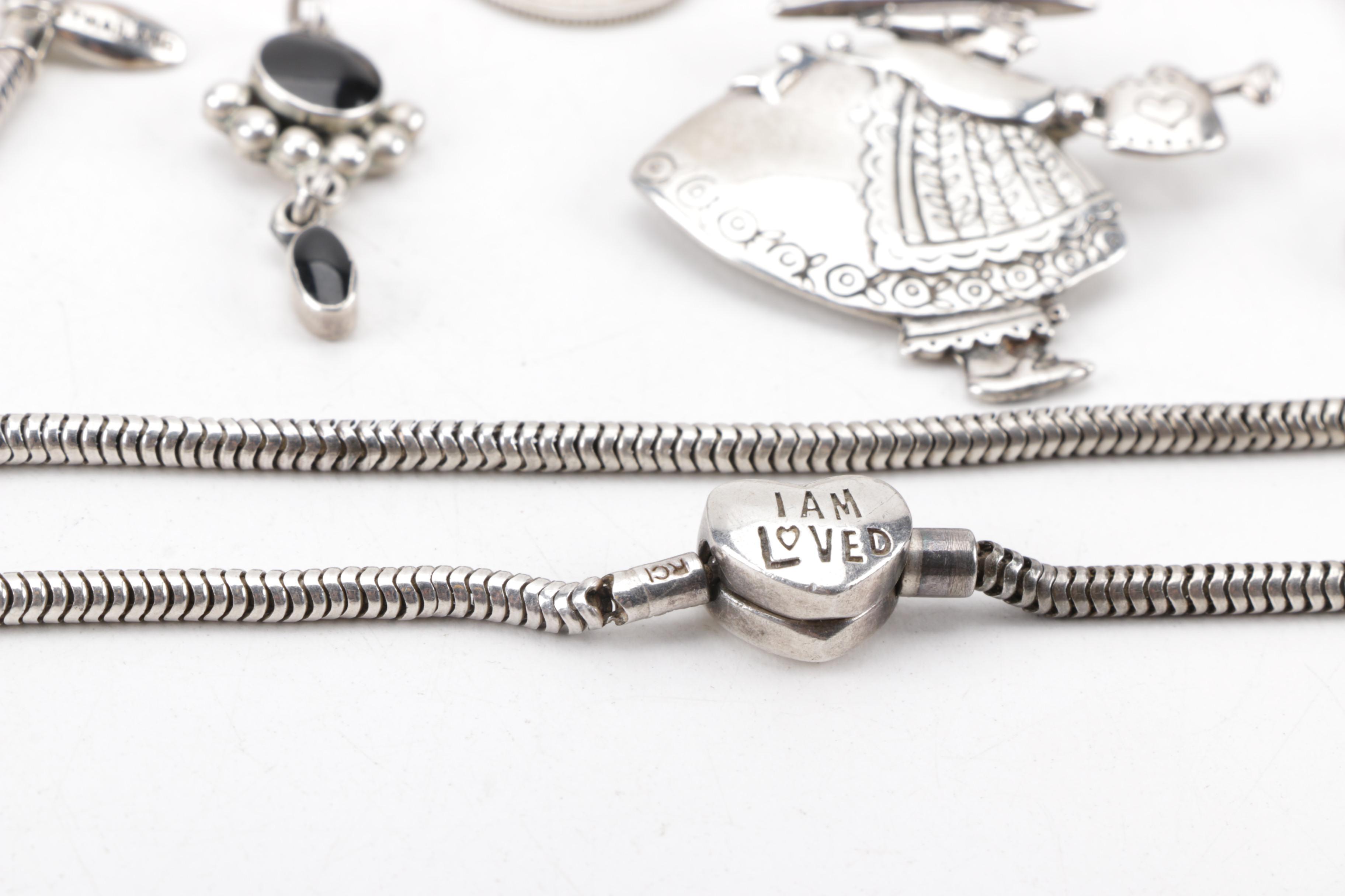 Assortment of Sterling Silver Jewelry Including Coin Pendants