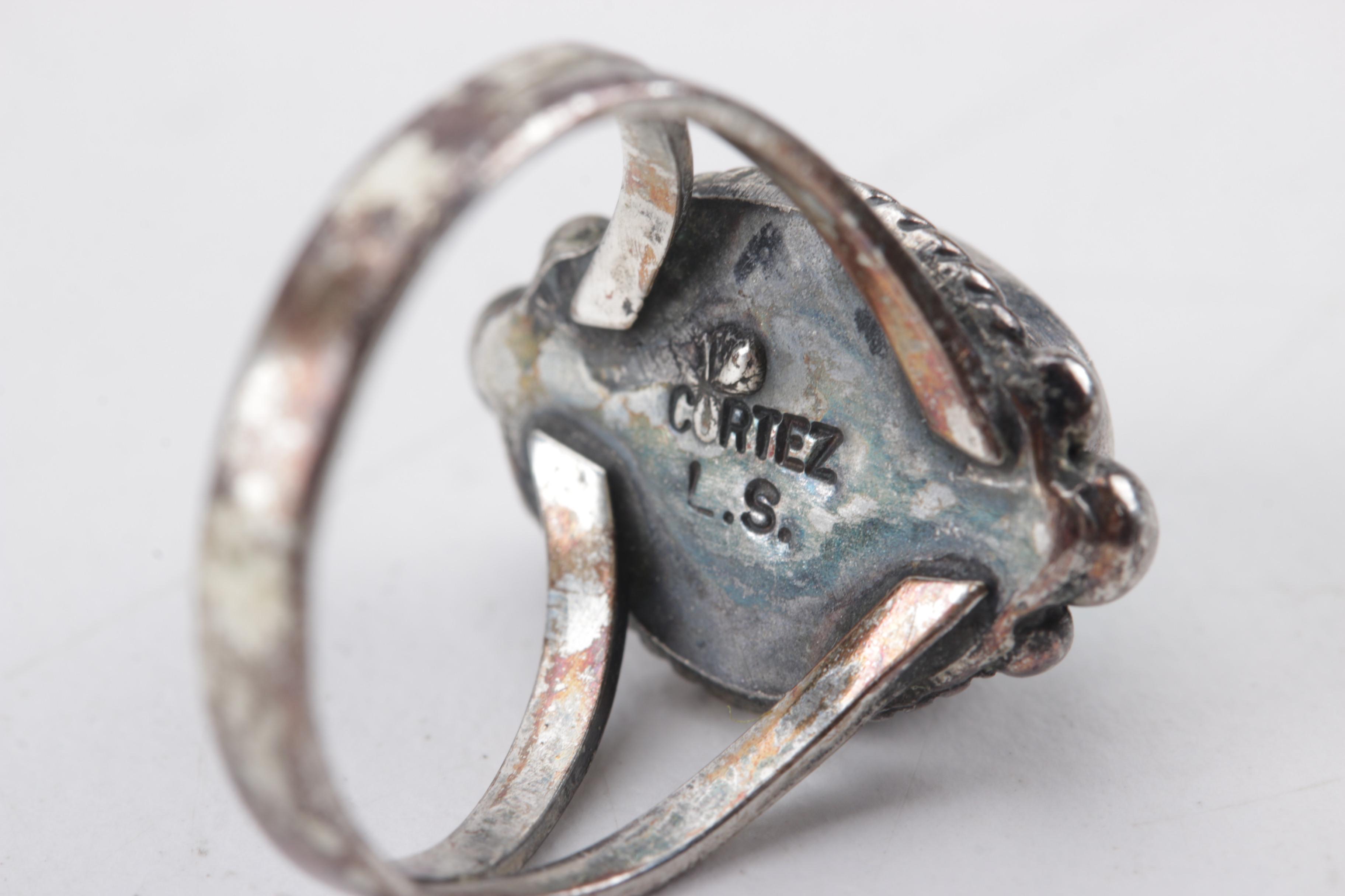 800 Silver Cuff Bracelet and Three Sterling Silver Rings Set with Mixed Stones