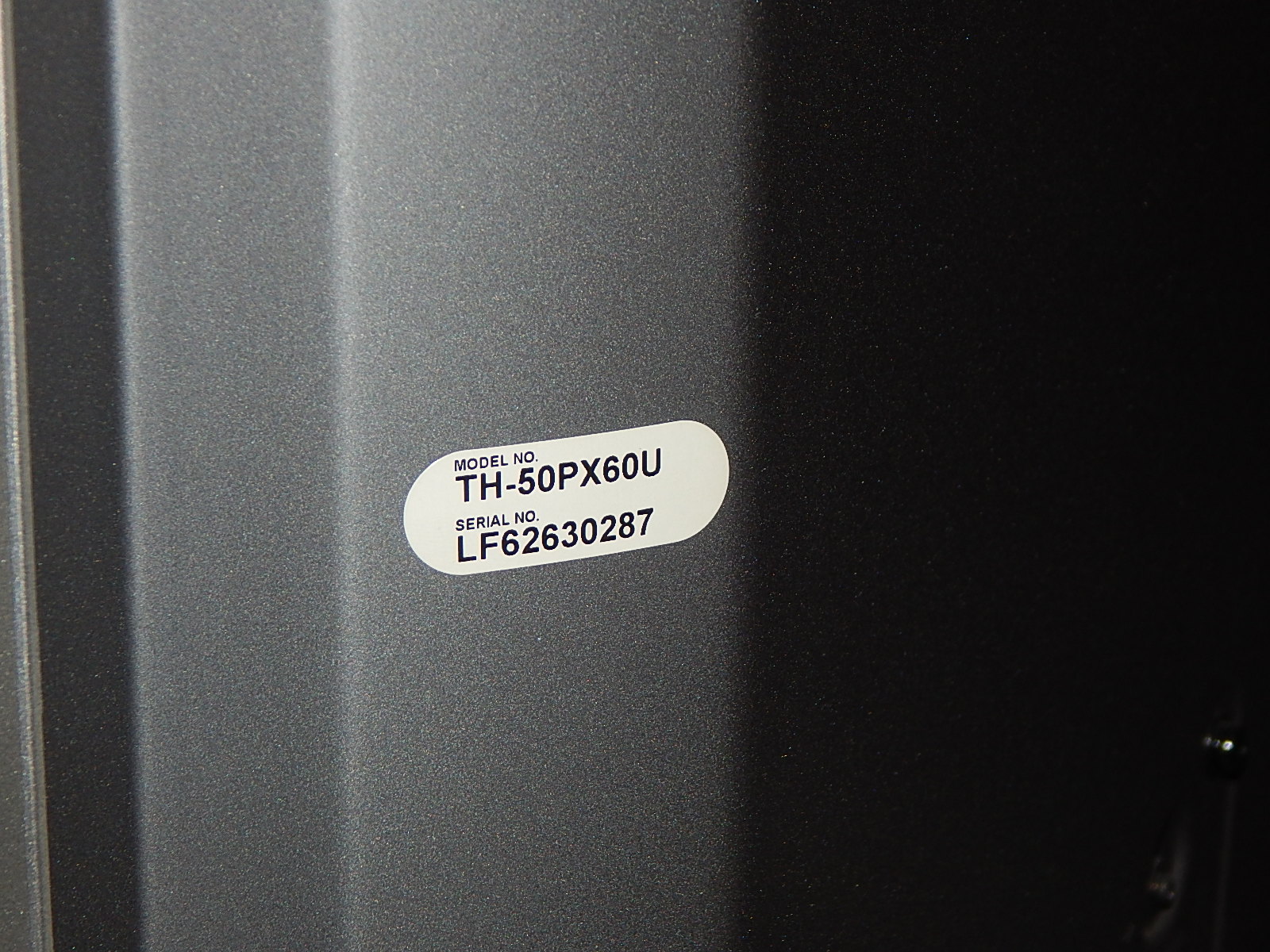 50" Panasonic Television and Stereo Equipment with Black Entertainment Console