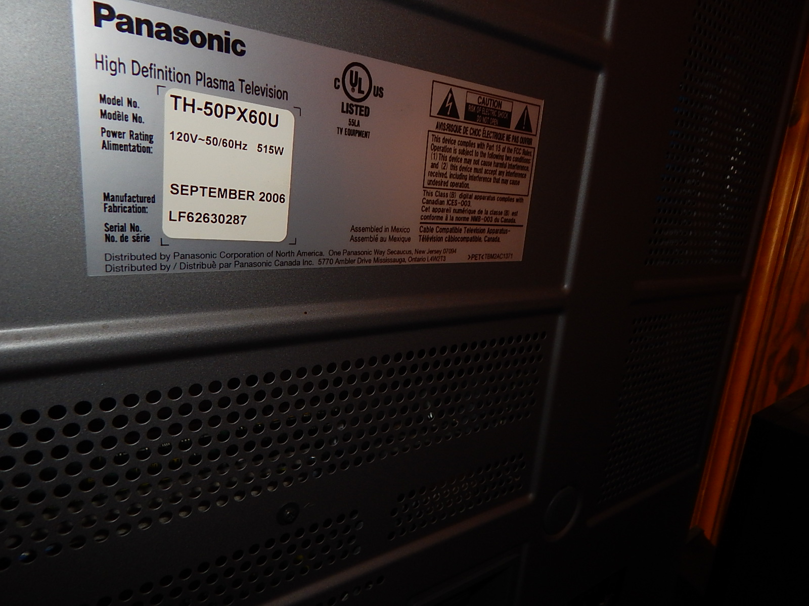 50" Panasonic Television and Stereo Equipment with Black Entertainment Console