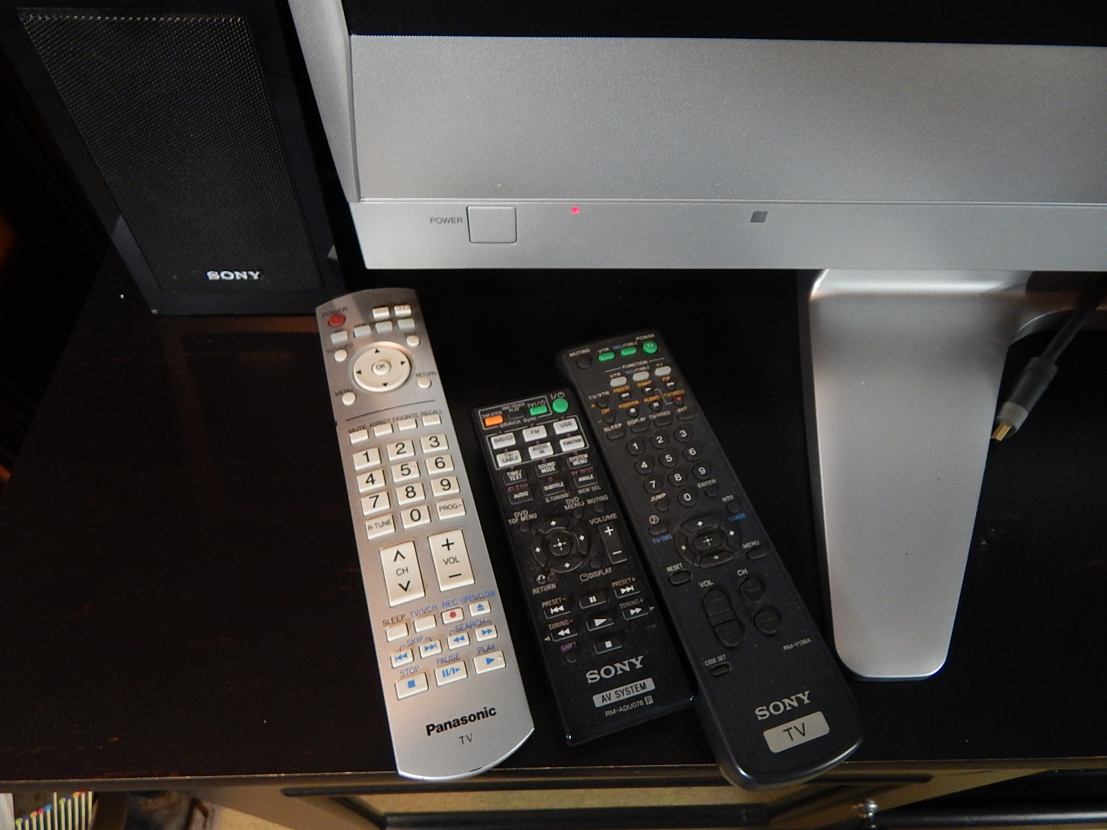 50" Panasonic Television and Stereo Equipment with Black Entertainment Console