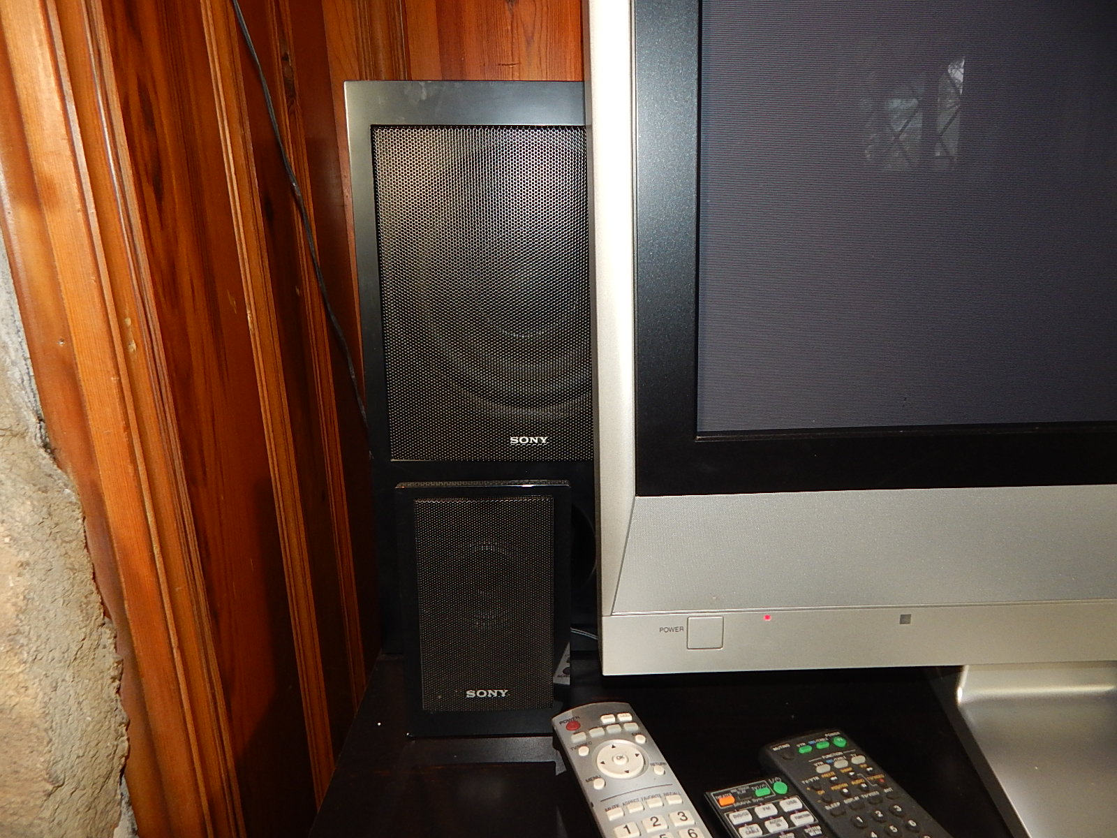 50" Panasonic Television and Stereo Equipment with Black Entertainment Console