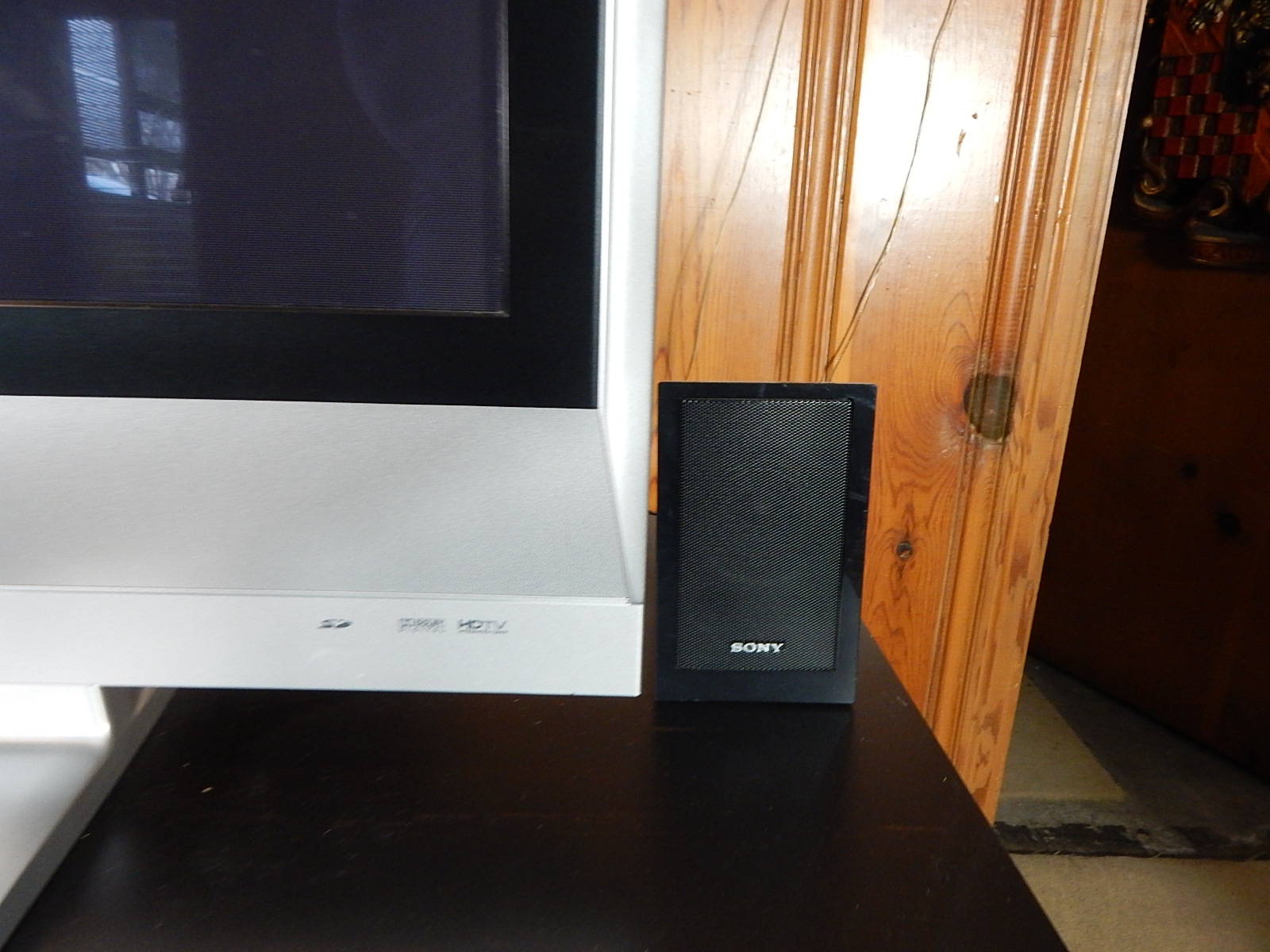 50" Panasonic Television and Stereo Equipment with Black Entertainment Console