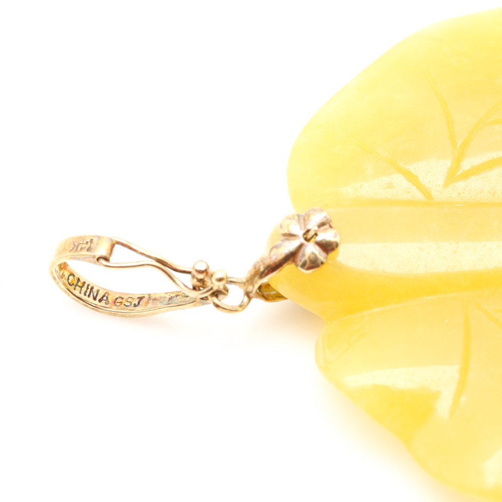 Assortment of 14K Yellow Gold Carved Gemstone Pendants