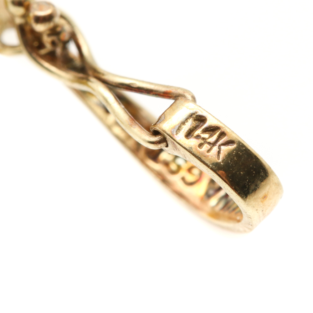 Assortment of 14K Yellow Gold Carved Gemstone Pendants