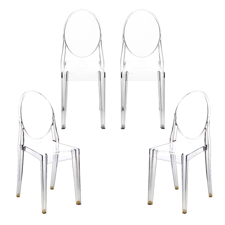 Four Kartell Victoria Ghost Dining Chairs