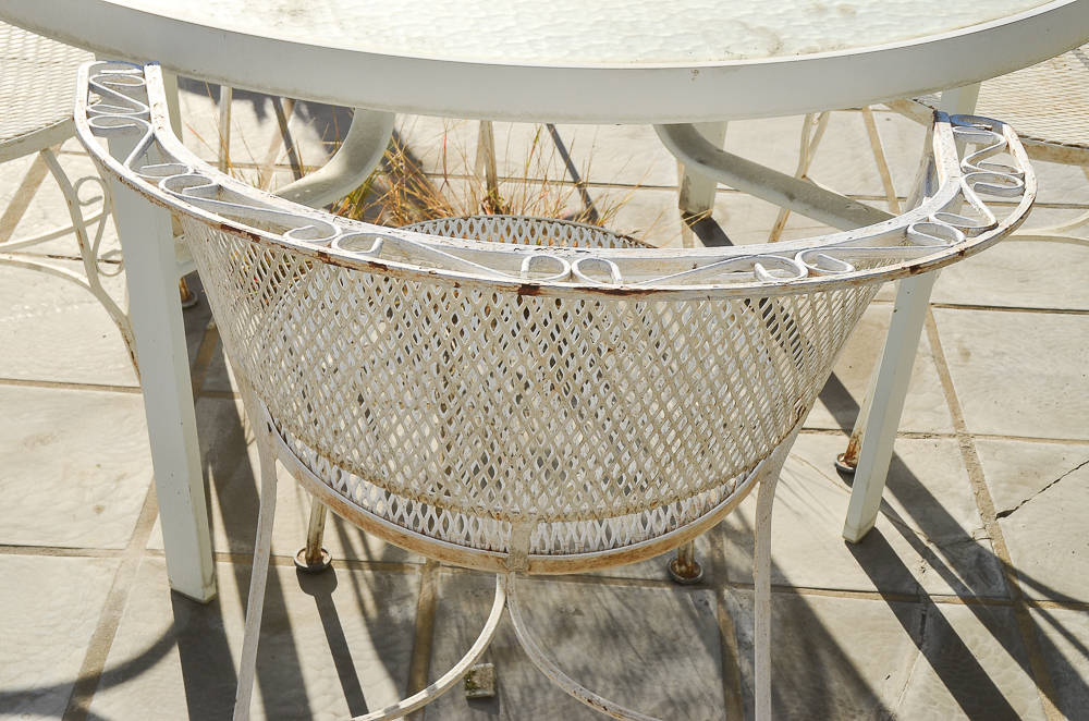 White Wrought Iron Outdoor Table with Four Chairs