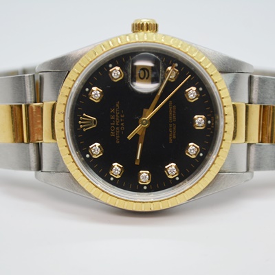 Rolex Oyster Perpetual Date 18K Yellow Gold Watch