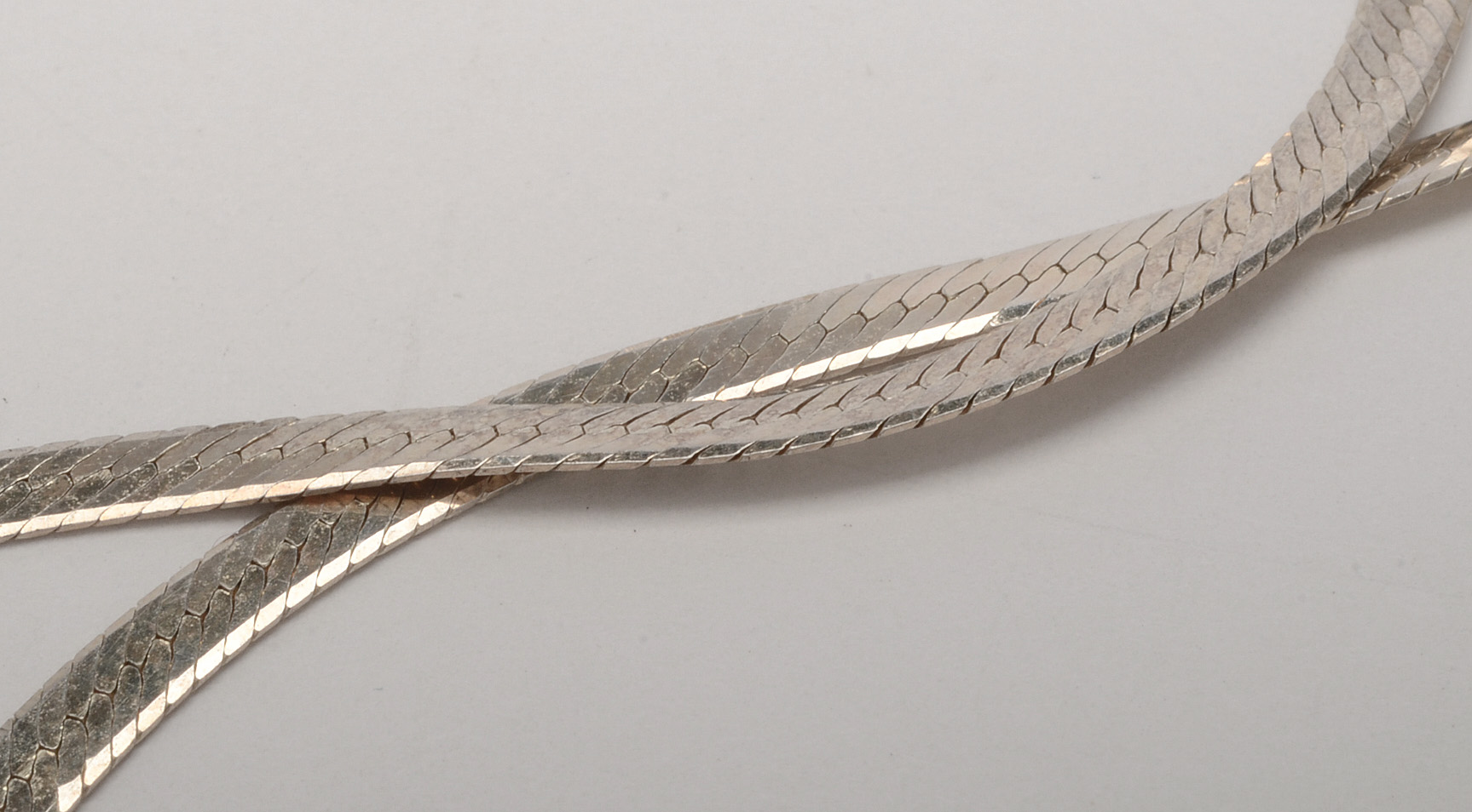 Sterling Silver Bangle and Two Herringbone Chains