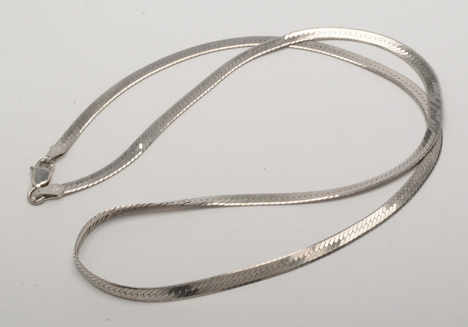 Sterling Silver Bangle and Two Herringbone Chains
