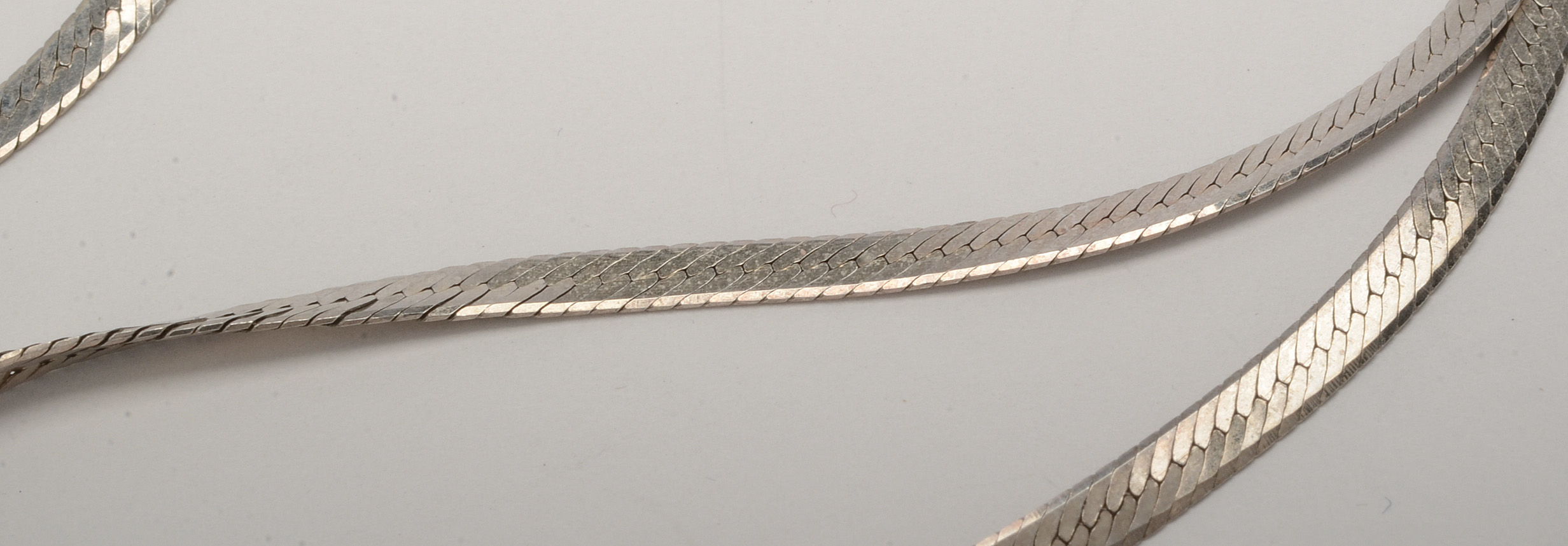 Sterling Silver Bangle and Two Herringbone Chains