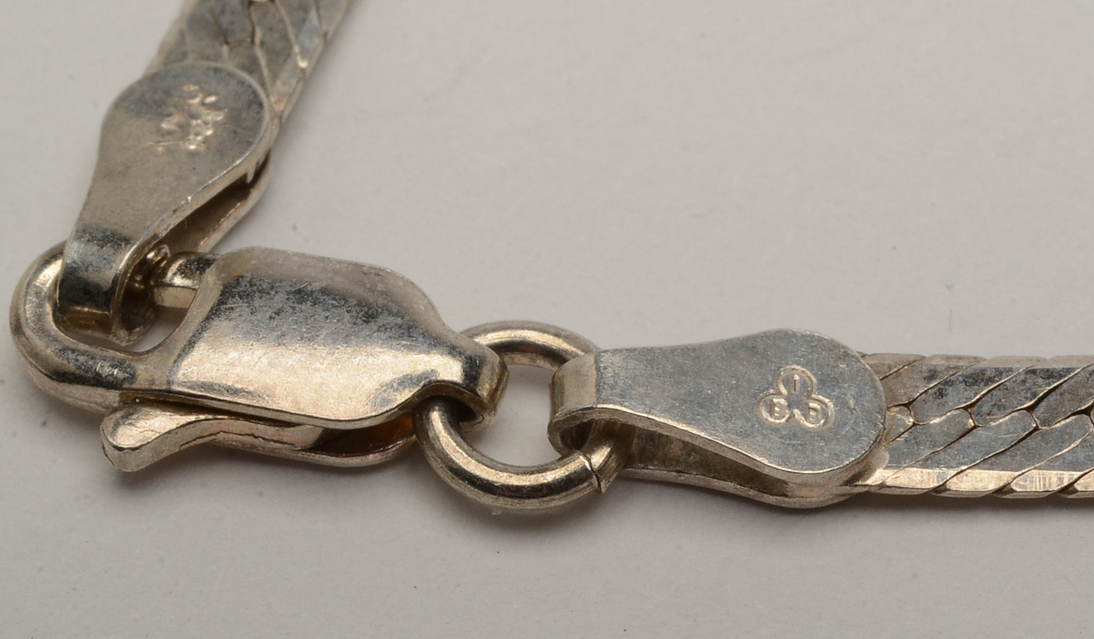 Sterling Silver Bangle and Two Herringbone Chains