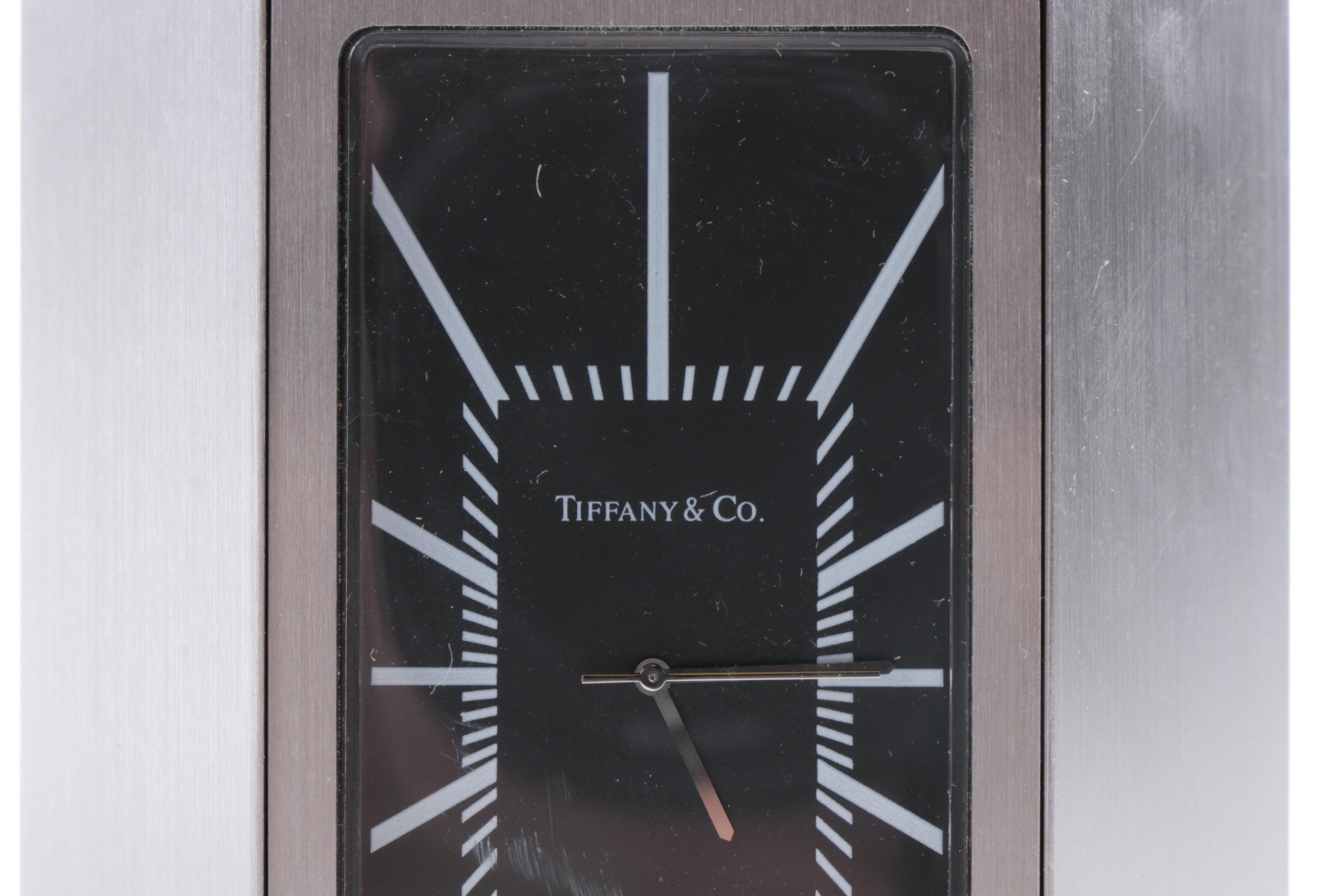 Tiffany & Co. Desk Clock and "Watches: The Ultimate Guide" by Fabienne Reybaud