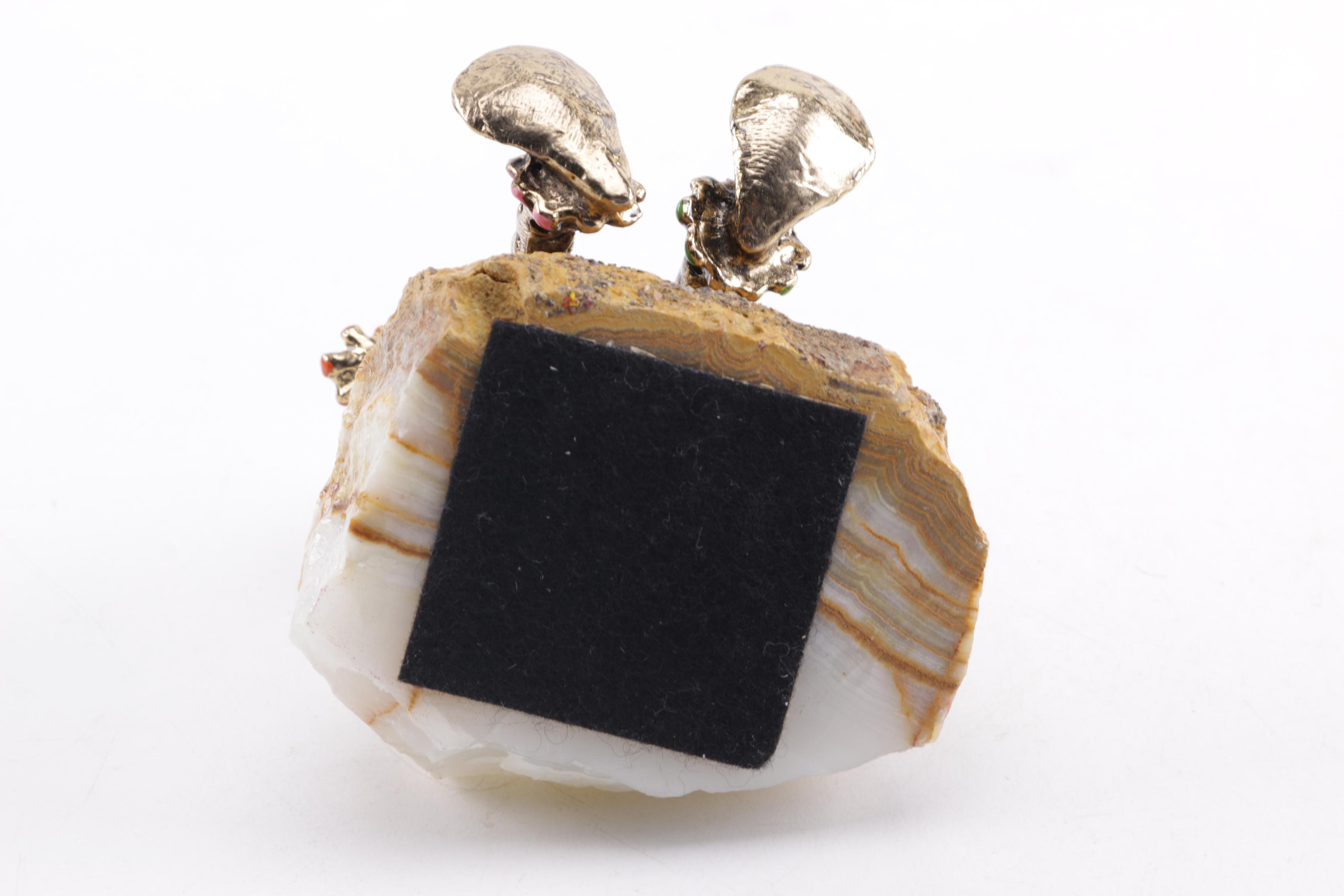 Pair of Seated Clown Figurines on Stone Bases