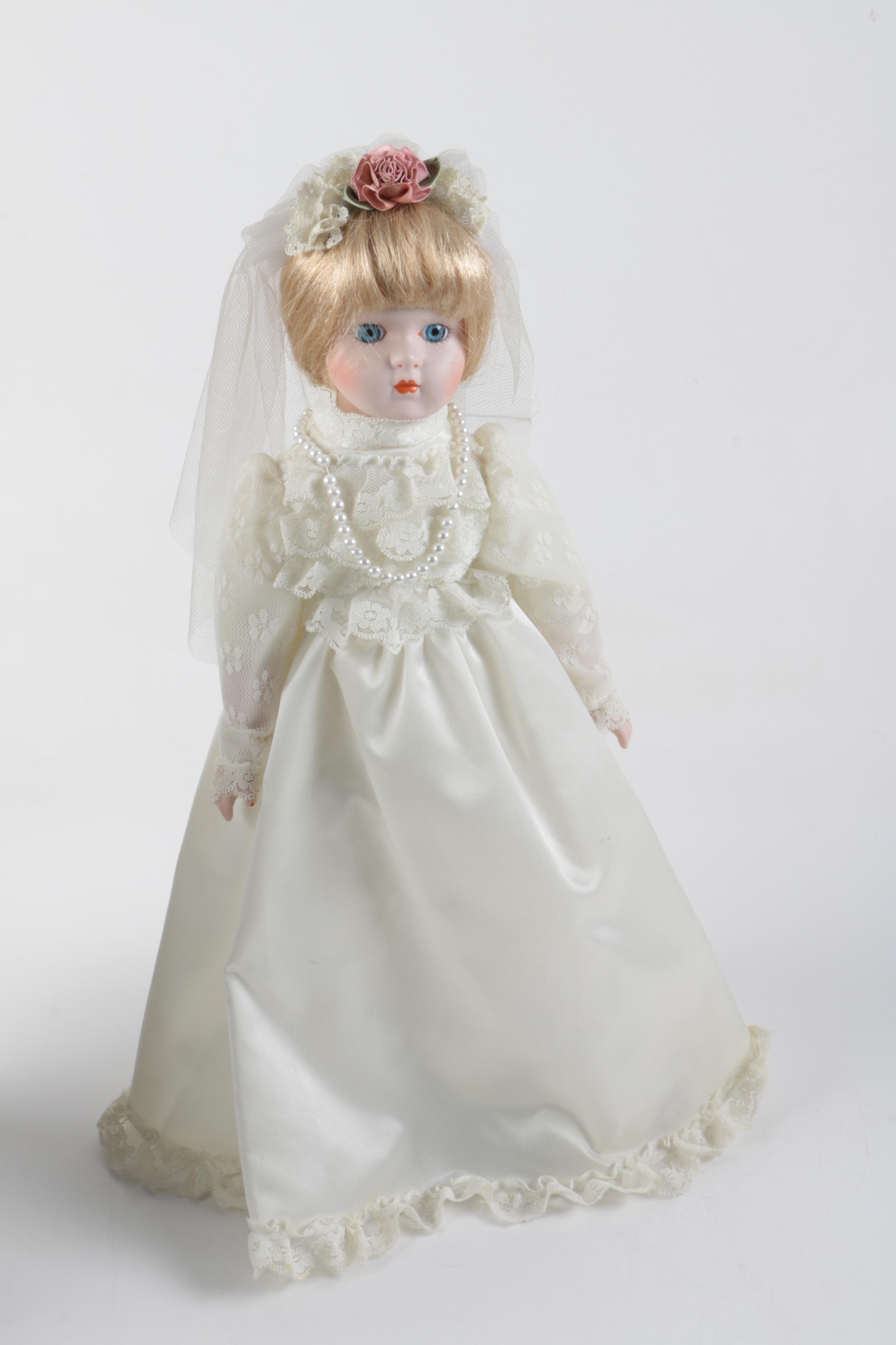 C. 1940s Imperial Composition Baby Doll with Vintage Porcelain Dolls