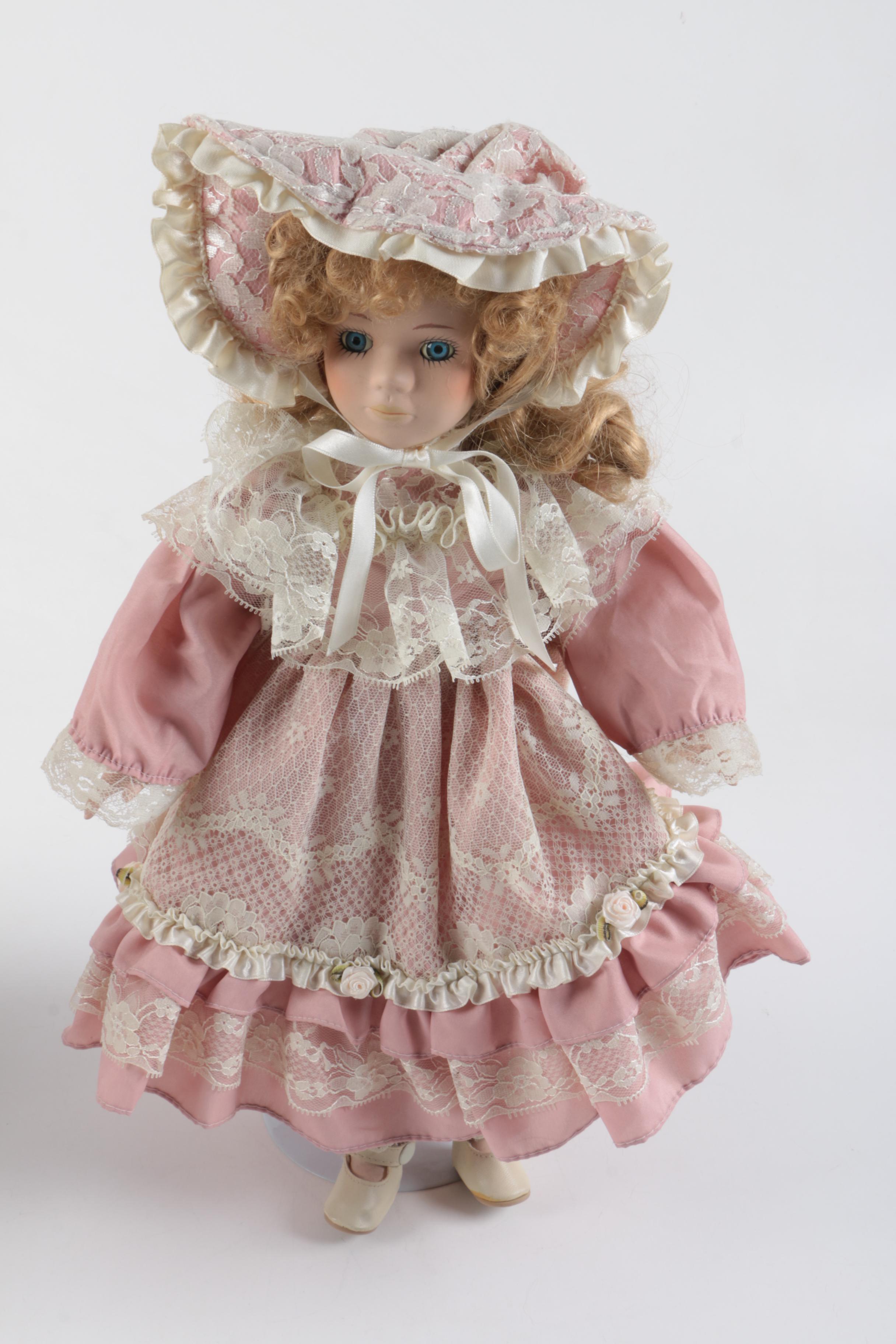 C. 1940s Imperial Composition Baby Doll with Vintage Porcelain Dolls