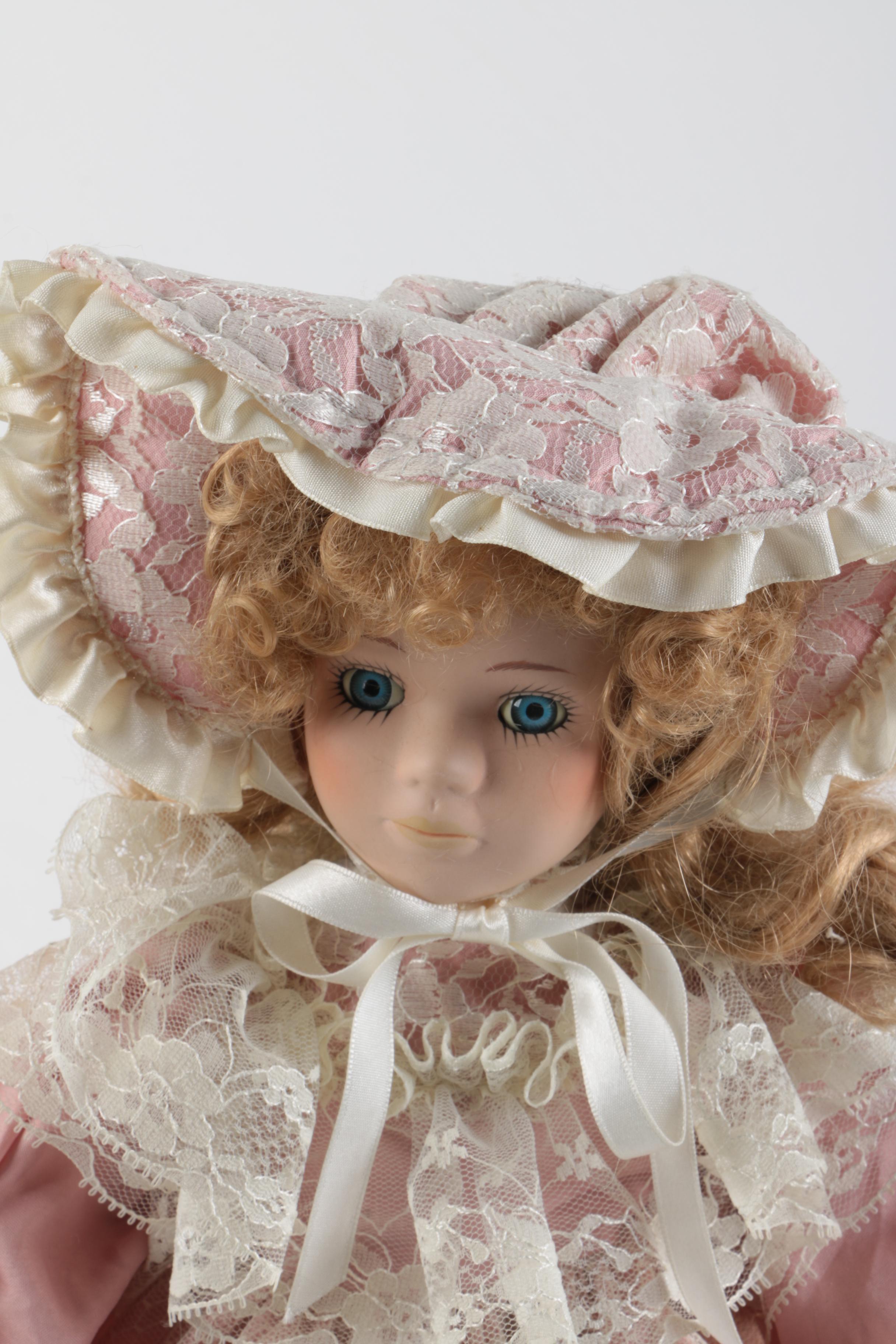 C. 1940s Imperial Composition Baby Doll with Vintage Porcelain Dolls