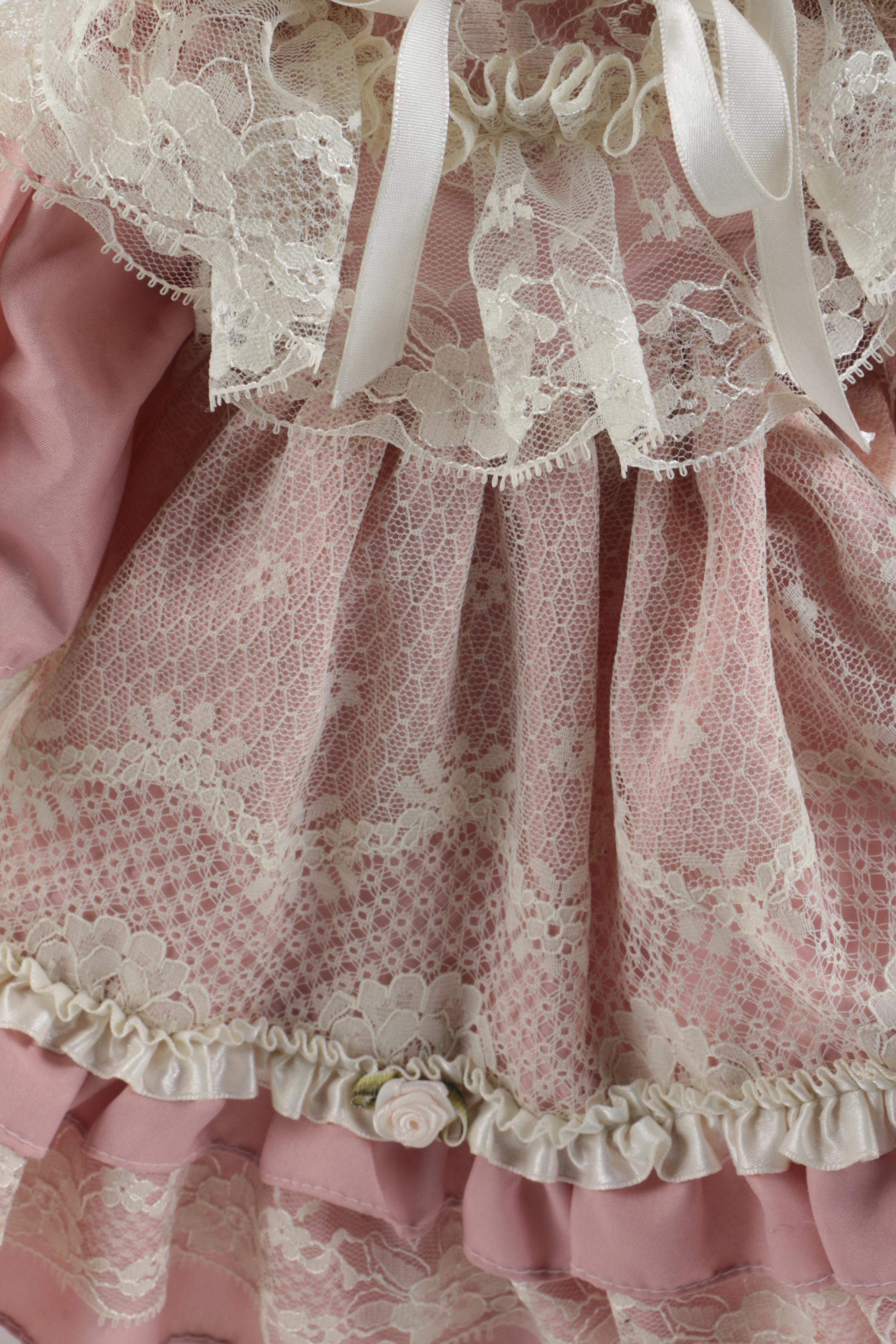 C. 1940s Imperial Composition Baby Doll with Vintage Porcelain Dolls