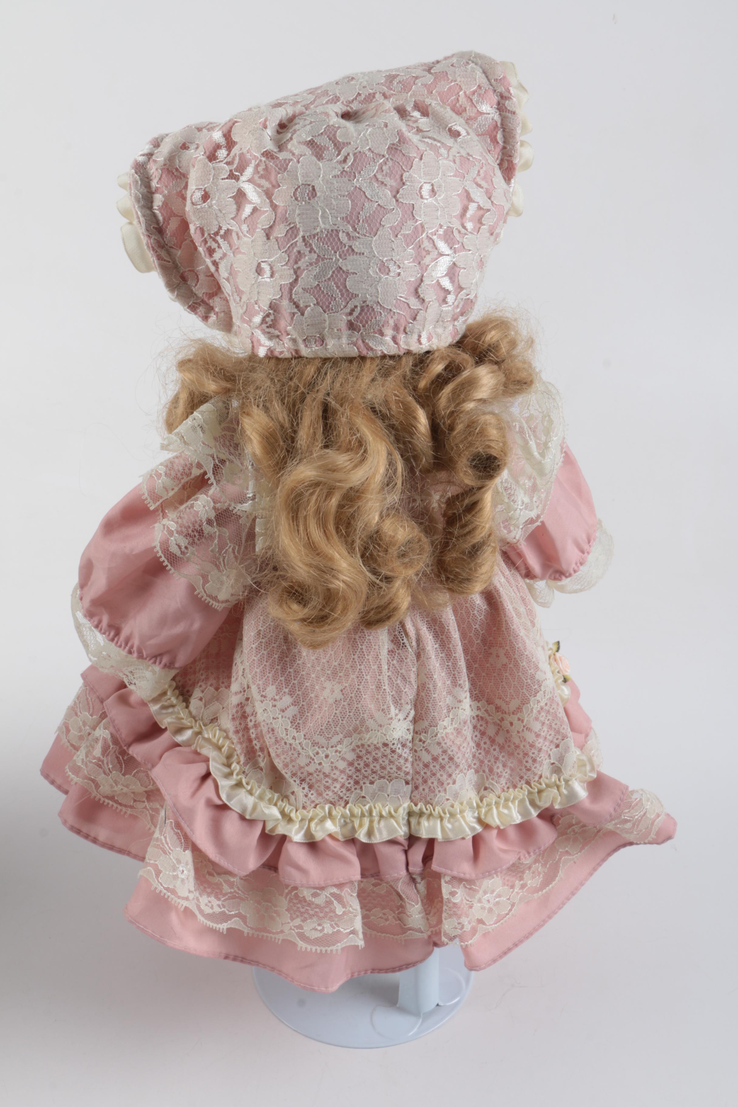 C. 1940s Imperial Composition Baby Doll with Vintage Porcelain Dolls