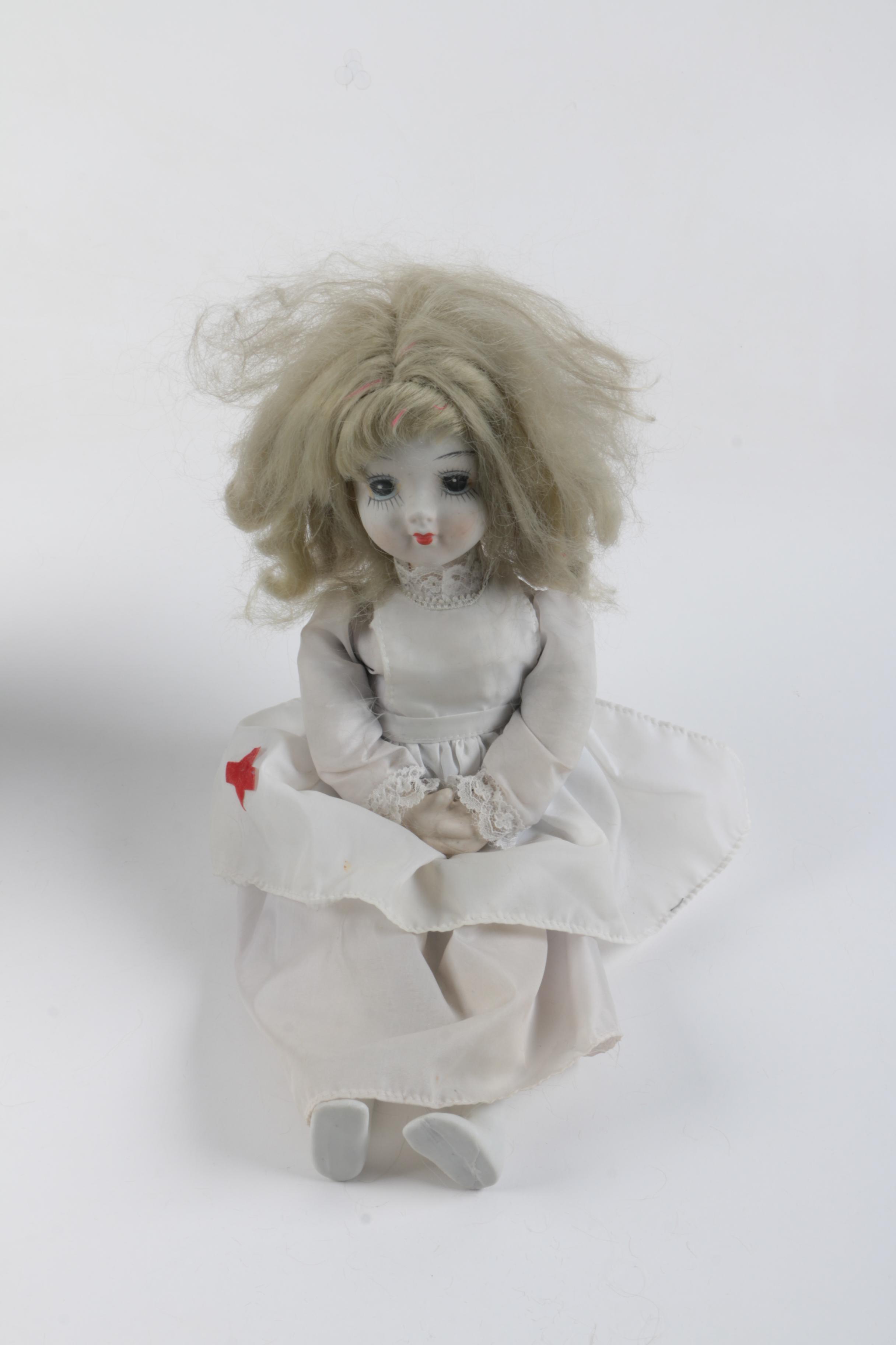 C. 1940s Imperial Composition Baby Doll with Vintage Porcelain Dolls