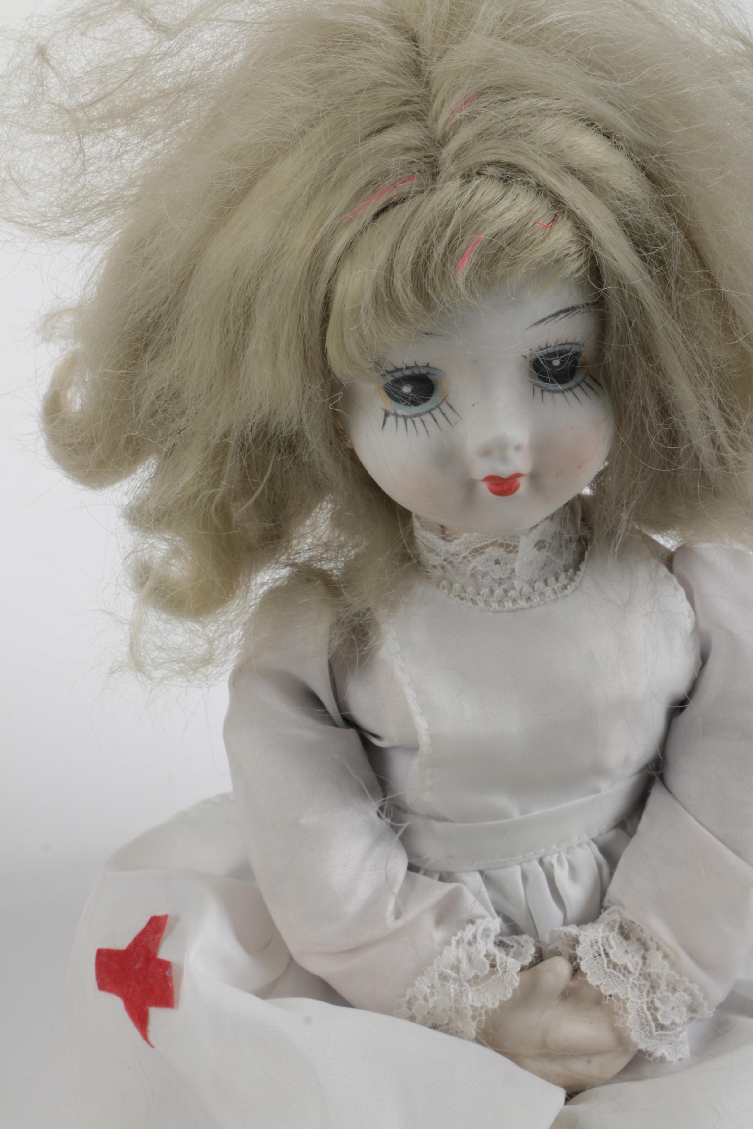 C. 1940s Imperial Composition Baby Doll with Vintage Porcelain Dolls