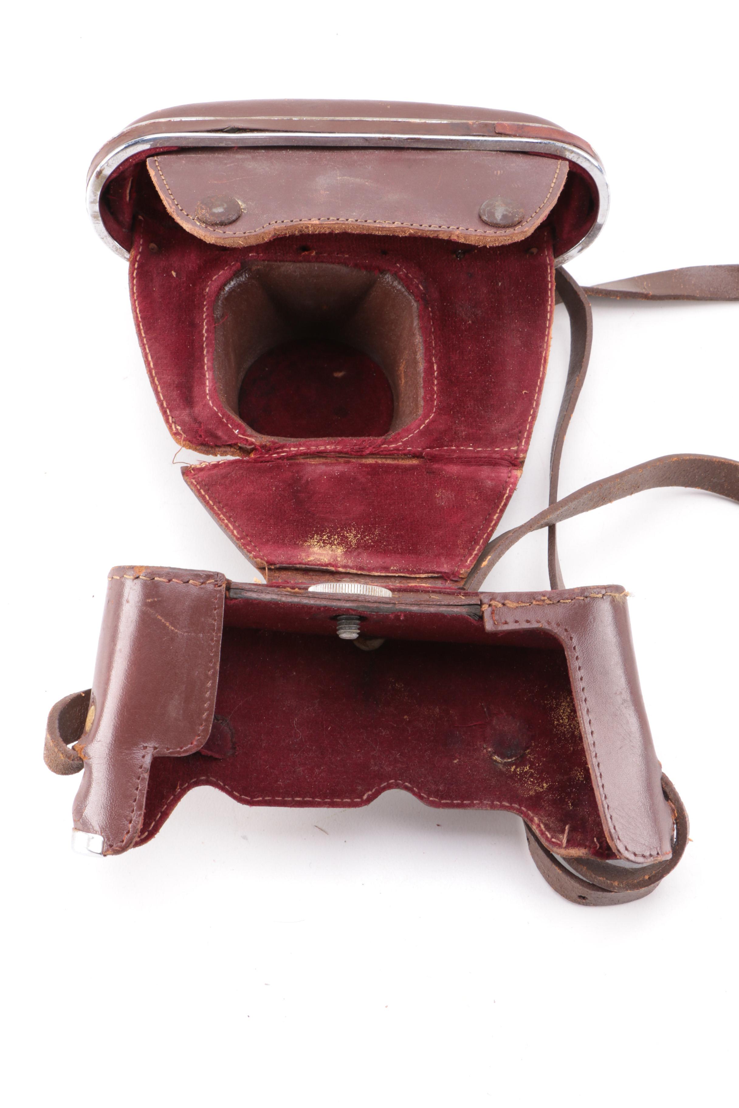 Vintage Zeiss Ikon AG SLR Camera with Two Leather Cases and Accessories