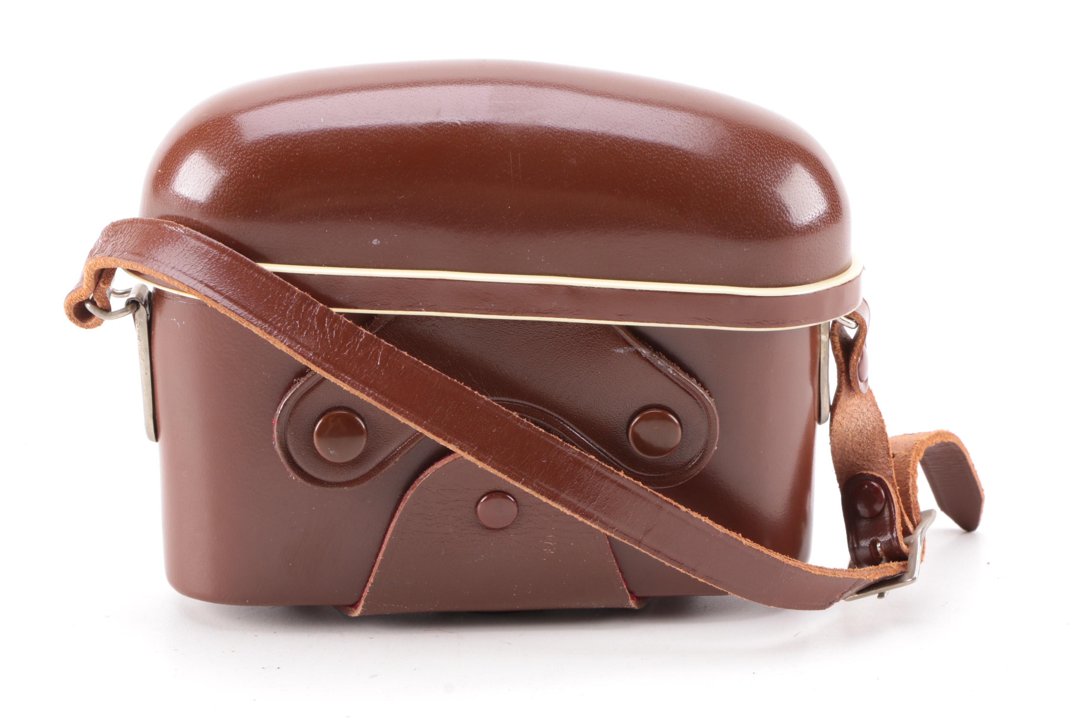 Vintage Zeiss Ikon AG SLR Camera with Two Leather Cases and Accessories