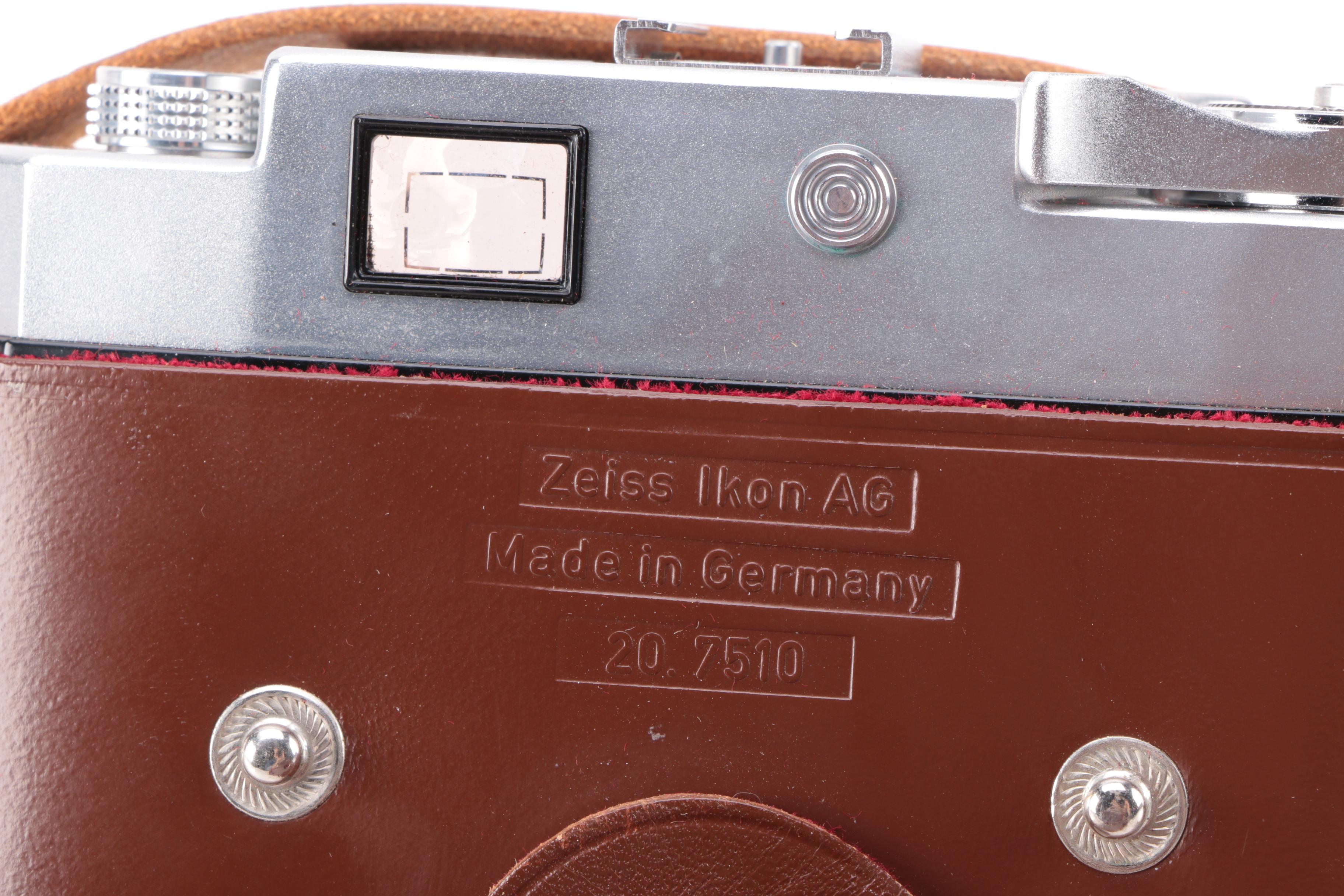 Vintage Zeiss Ikon AG SLR Camera with Two Leather Cases and Accessories