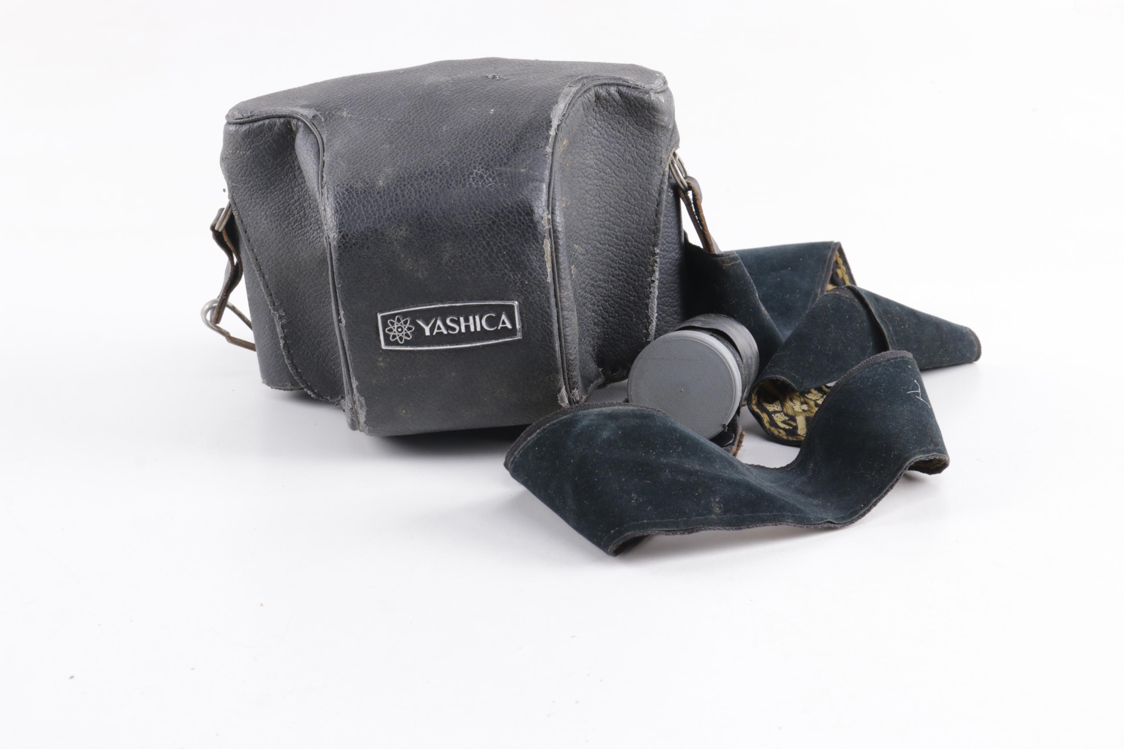 Nikkorex, Yashica, and Topcon 35mm Film Cameras and Sony Walkman