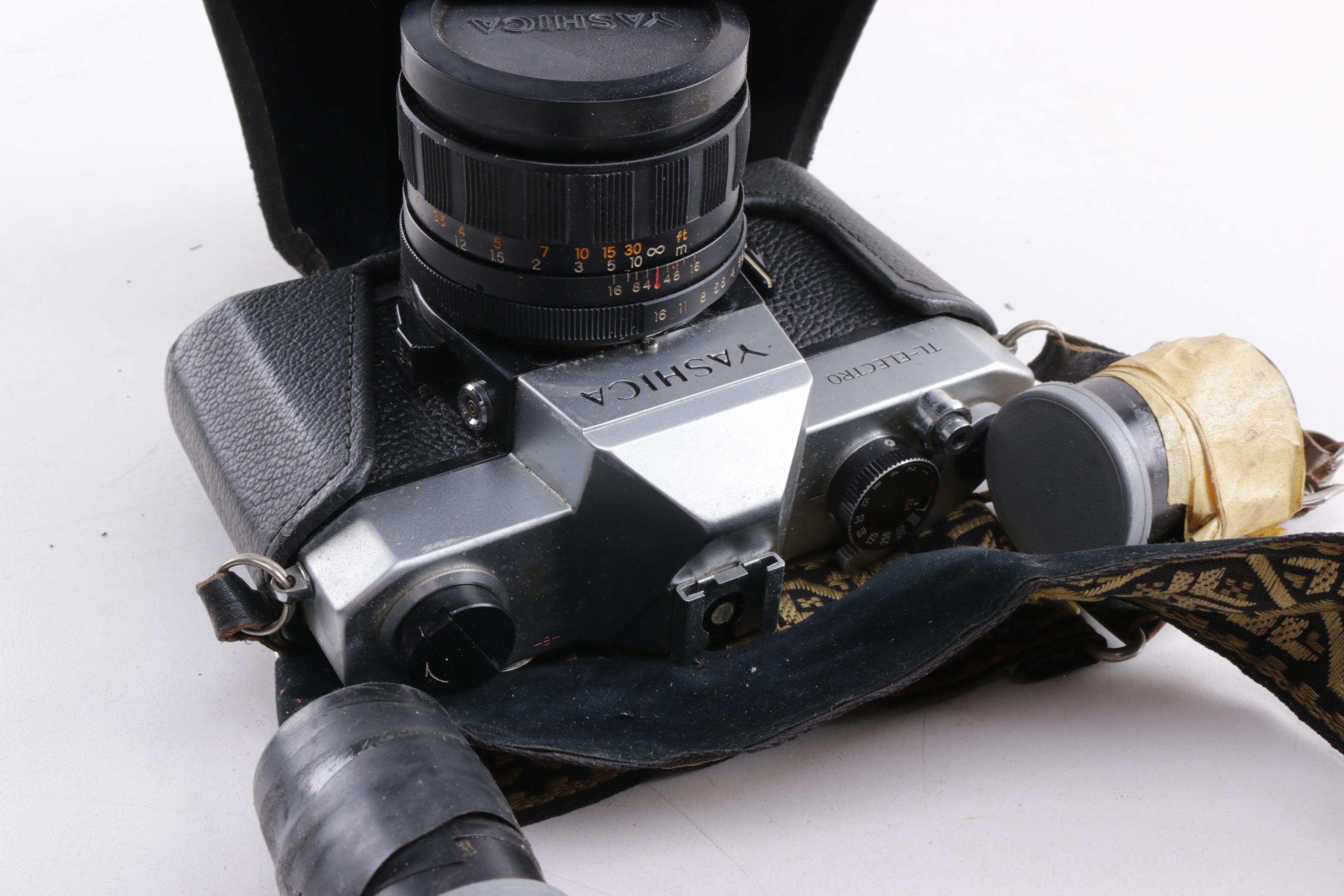 Nikkorex, Yashica, and Topcon 35mm Film Cameras and Sony Walkman