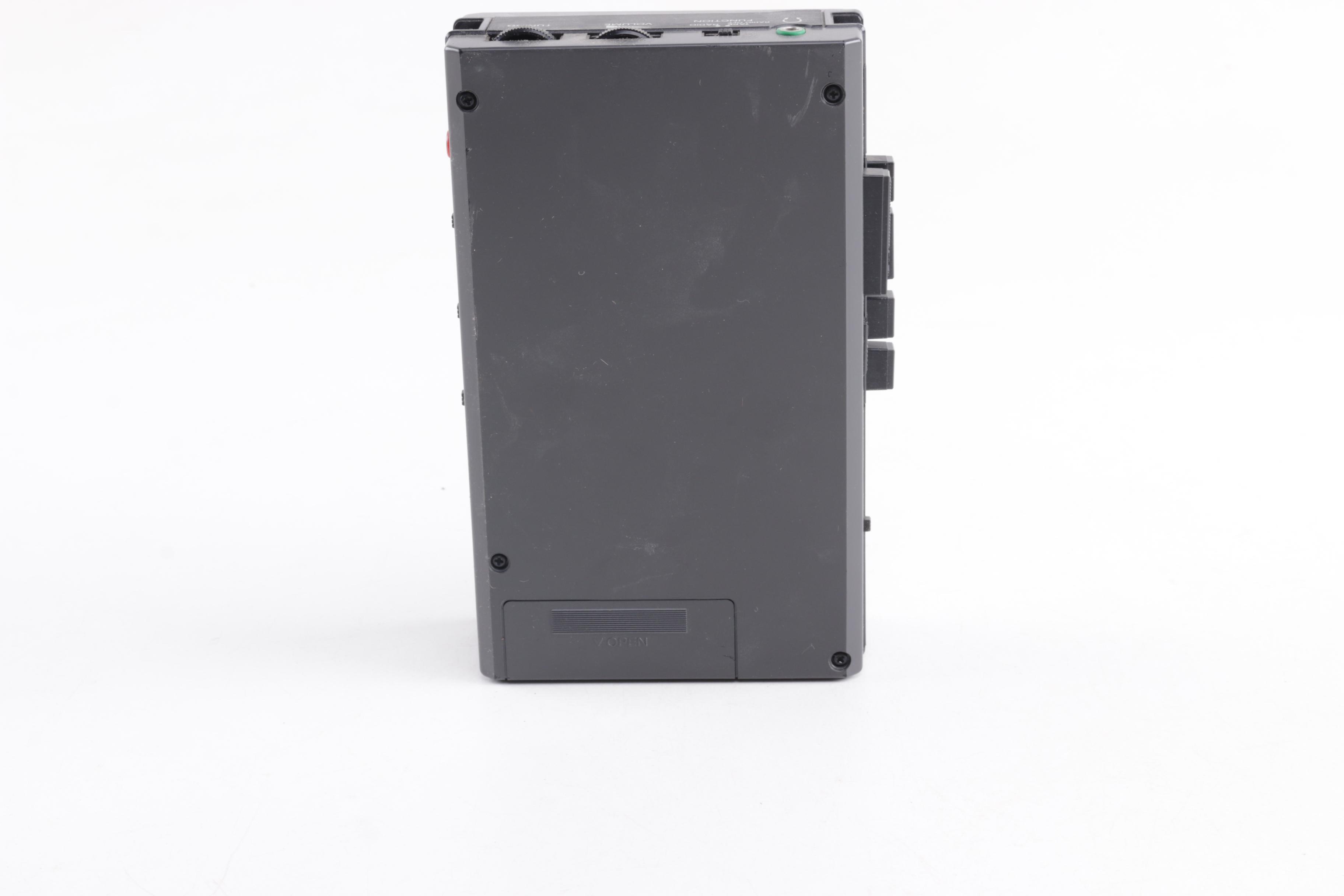 Nikkorex, Yashica, and Topcon 35mm Film Cameras and Sony Walkman